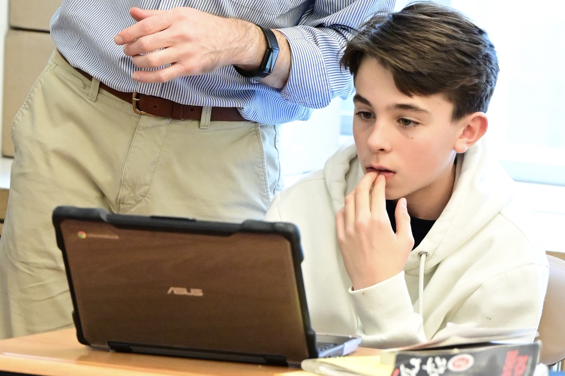 A Fieldston Middle 6th grader looks intently at a computer.