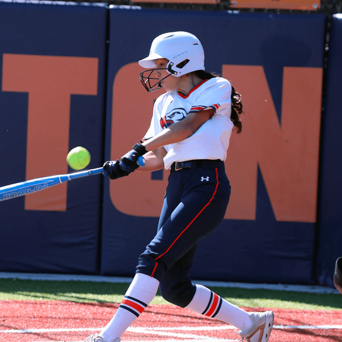 An Ethical Culture Fieldsotn softball player plays at Spring Fling.