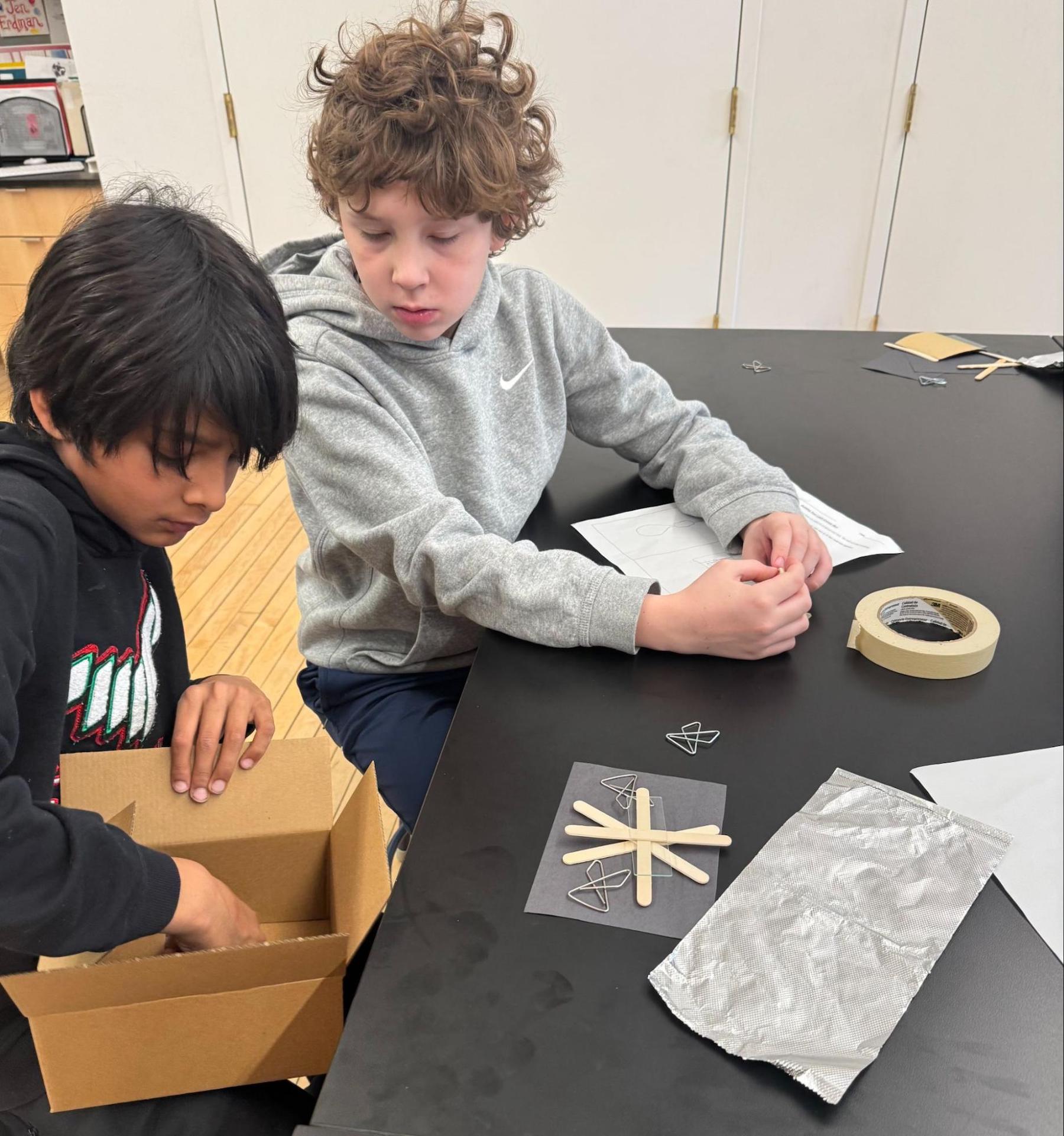 Ethical Culture 5th Graders doing science experiment