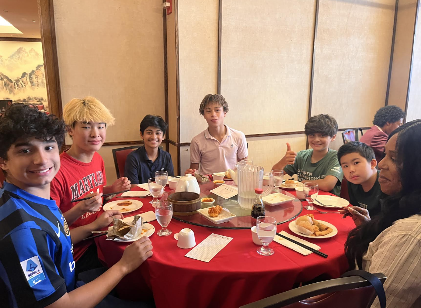 A group of ECFS students enjoy dim sum during an experiential learning trip to Chinatown