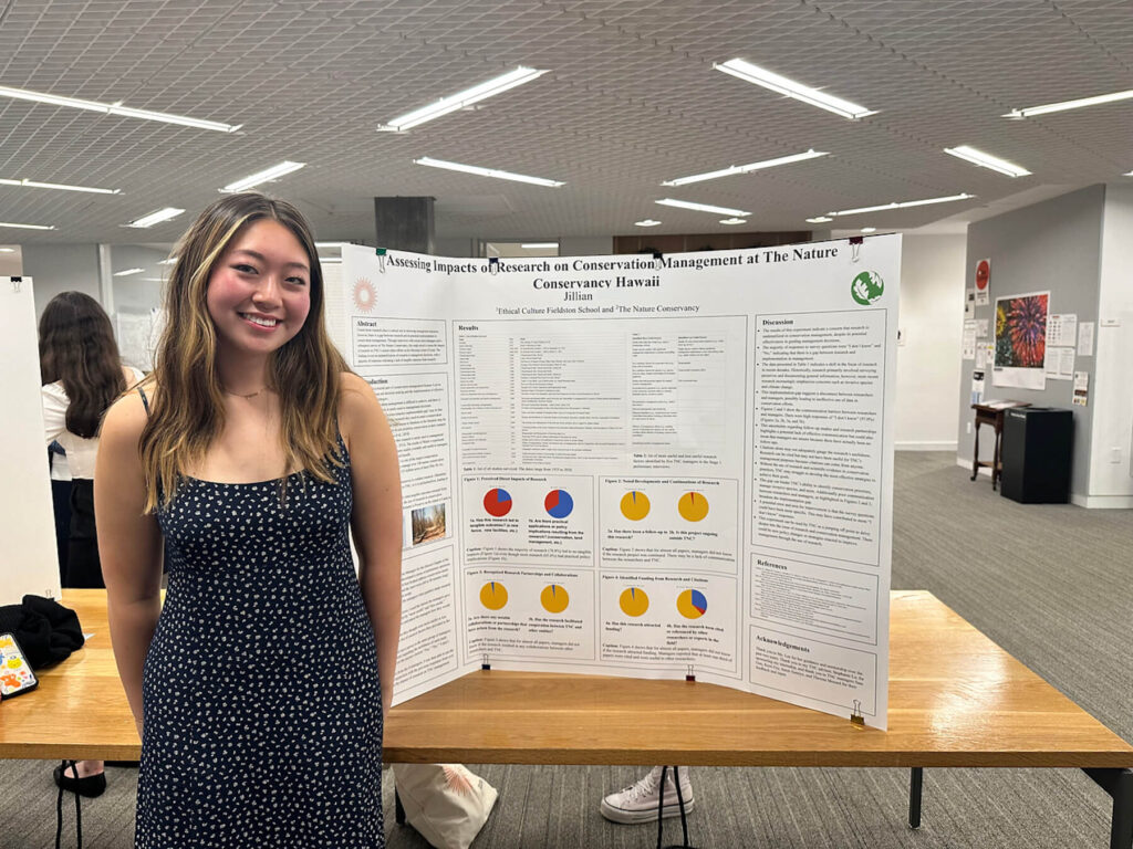 An Ethical Culture Fieldston School student speaks at science research event.