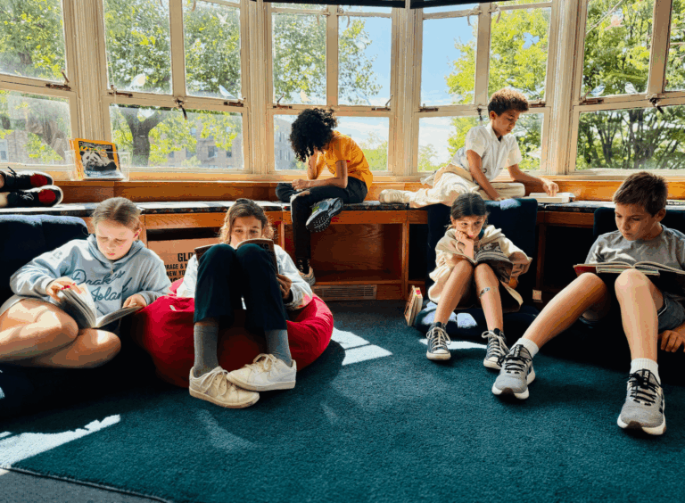 Ethical Culture Fieldston School 5th Graders read in the library.