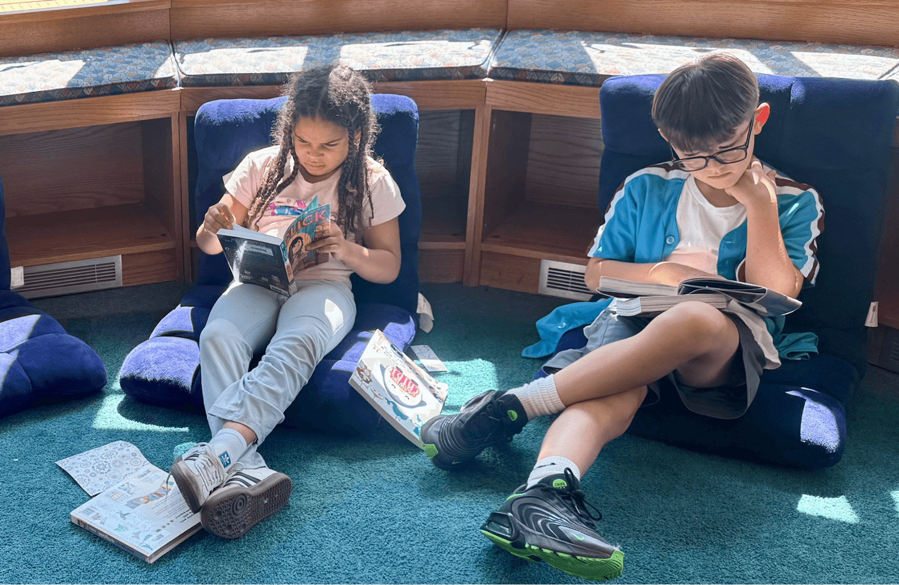 Ethical Culture Fieldston School 4th Graders read in the library.