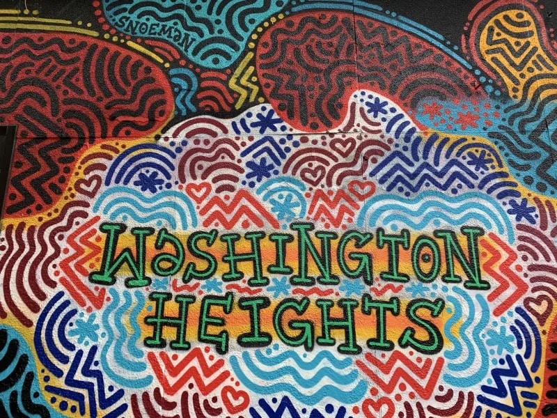 Photo of outdoor wall art that reads, "Washington Heights"