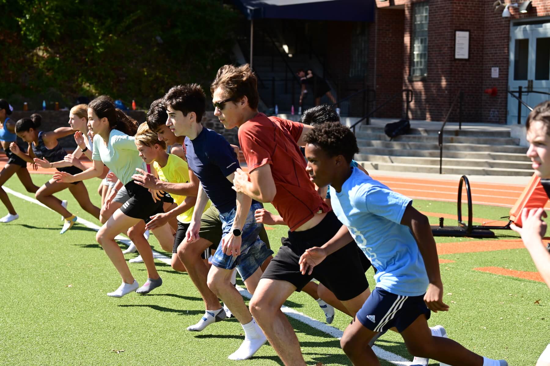 Ethical Culture Fieldston School Fieldston Upper track team practices on the field