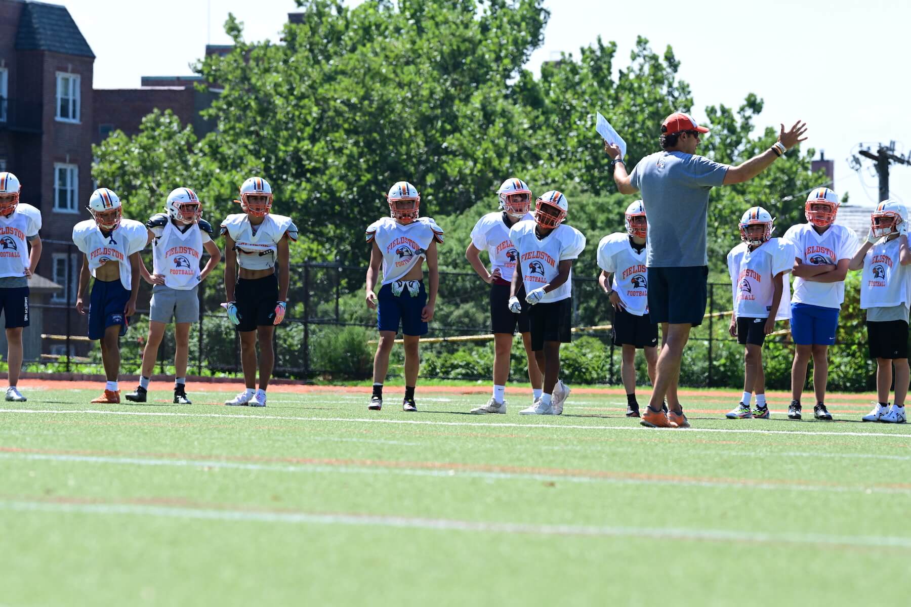 Ethical Culture Fieldston School Fieldston Upper football team practices on the field