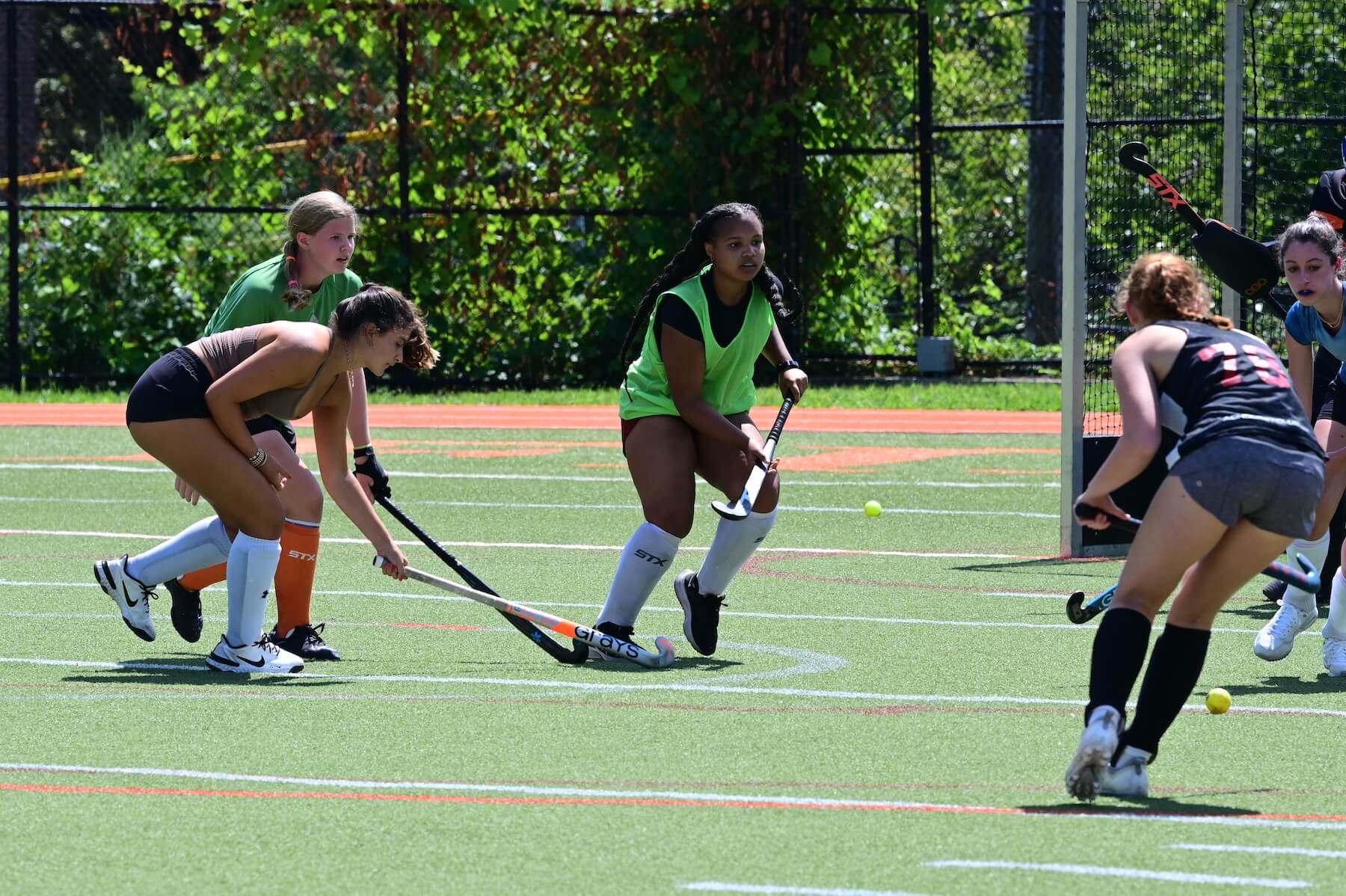 Ethical Culture Fieldston School Fieldston Upper girls field hockey practices on the field