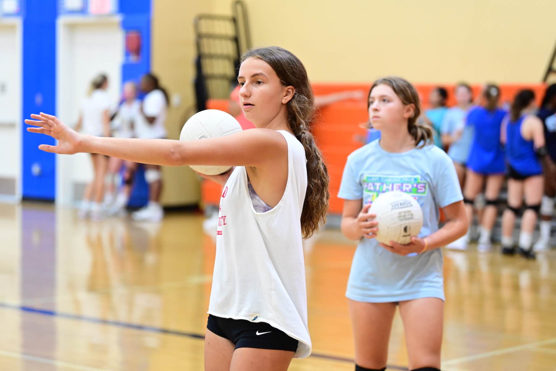 Ethical Culture Fieldston School Fieldston Upper volleyball team practices in the gym