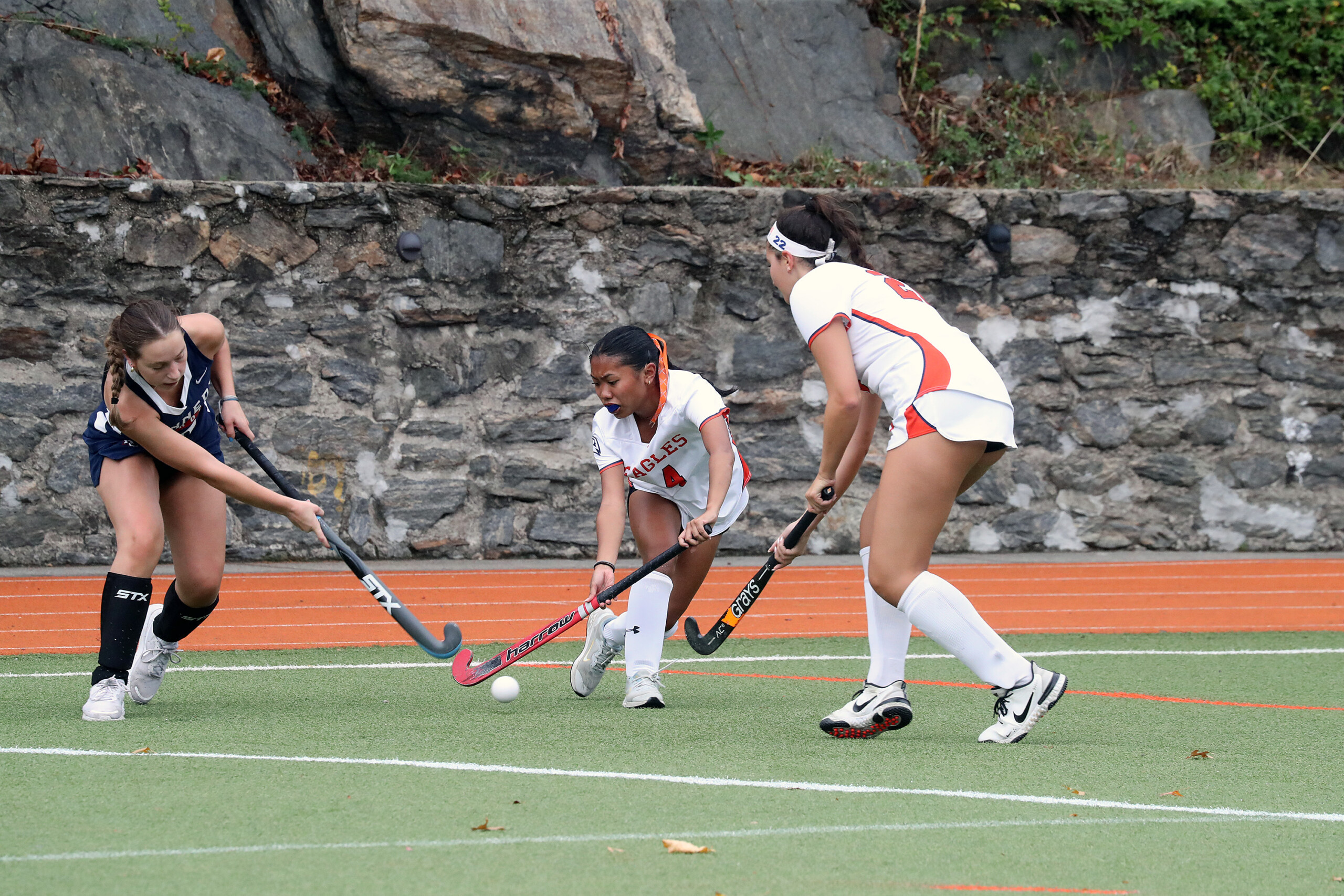 Two varsity field hockey players at the Ethical Culture Fieldston School