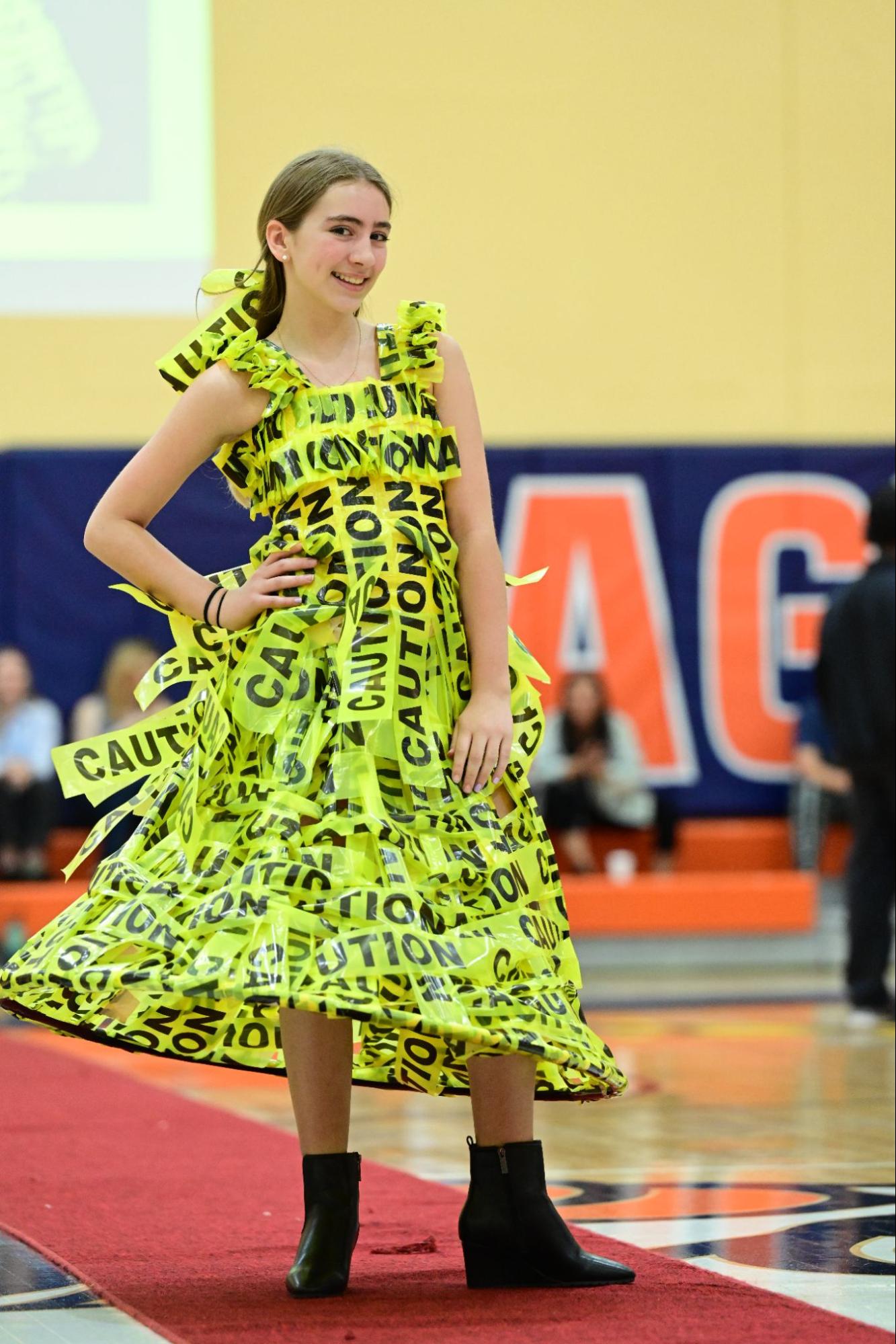 An ECFS student walks down the runway during the Fashion Show