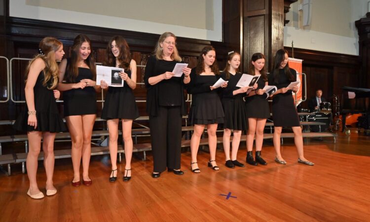 ECFS Middle School chorus students sing at Founder's Day
