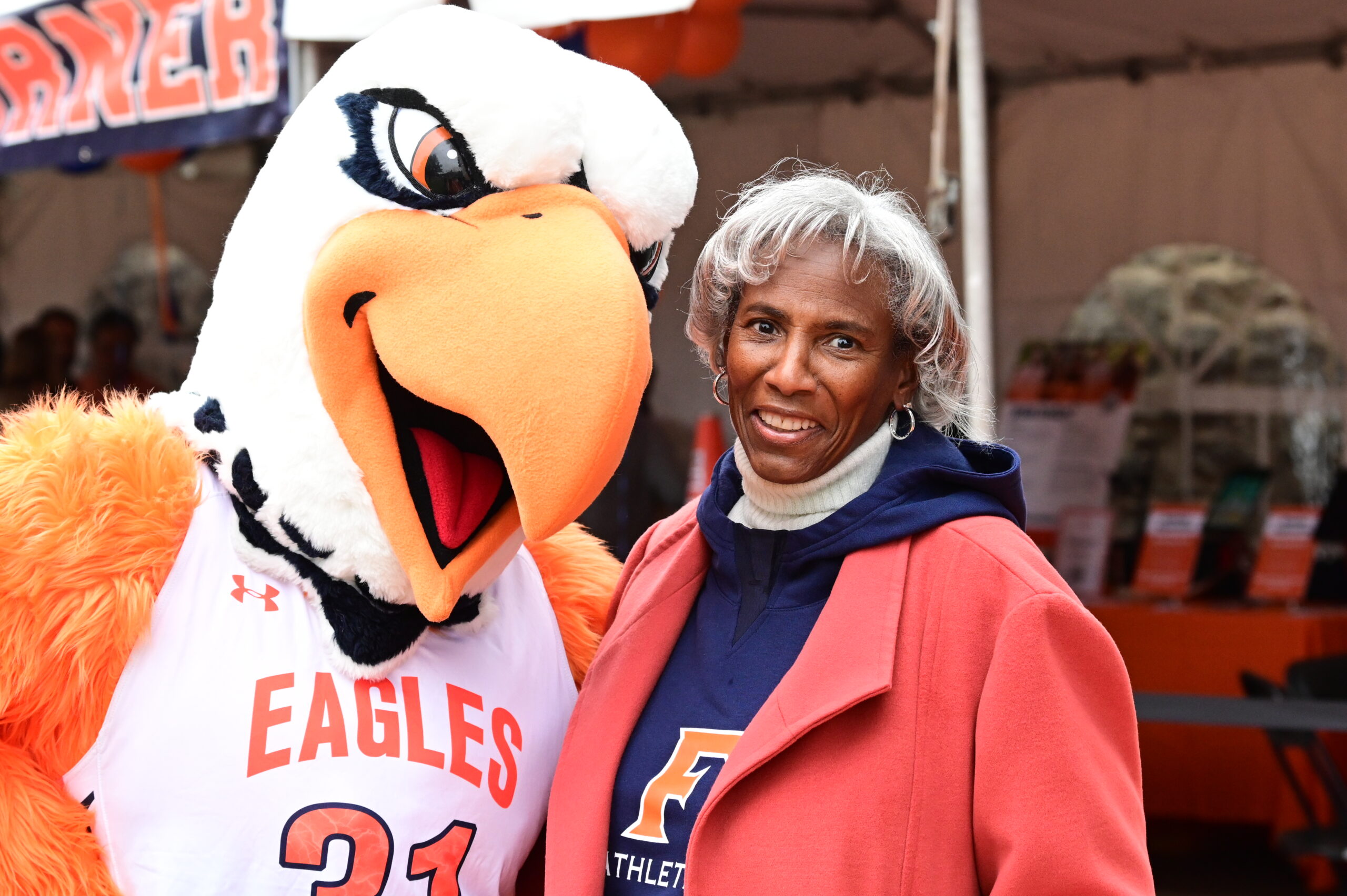 A community member poses with the ECFS eagle