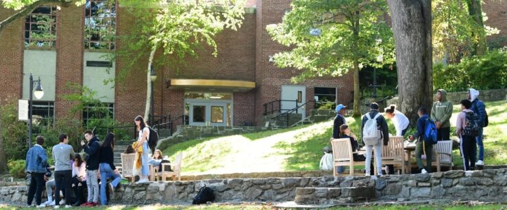 Ethical Culture Fieldston School Upper School students collecting on the quad