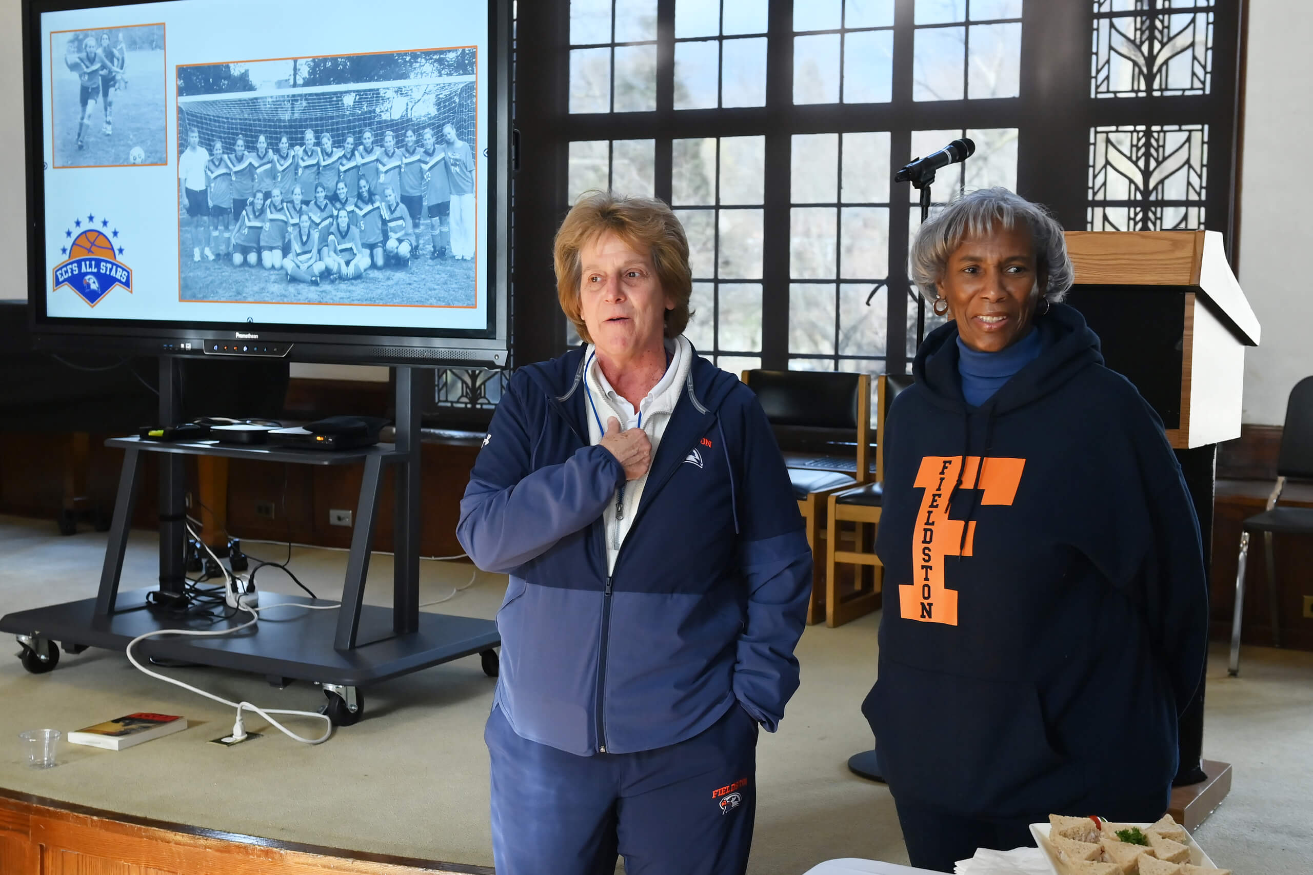Teachers and coaches Diane Toth and Janet Pugh speak about their experience playing sports at Fieldston at Title IX reception.