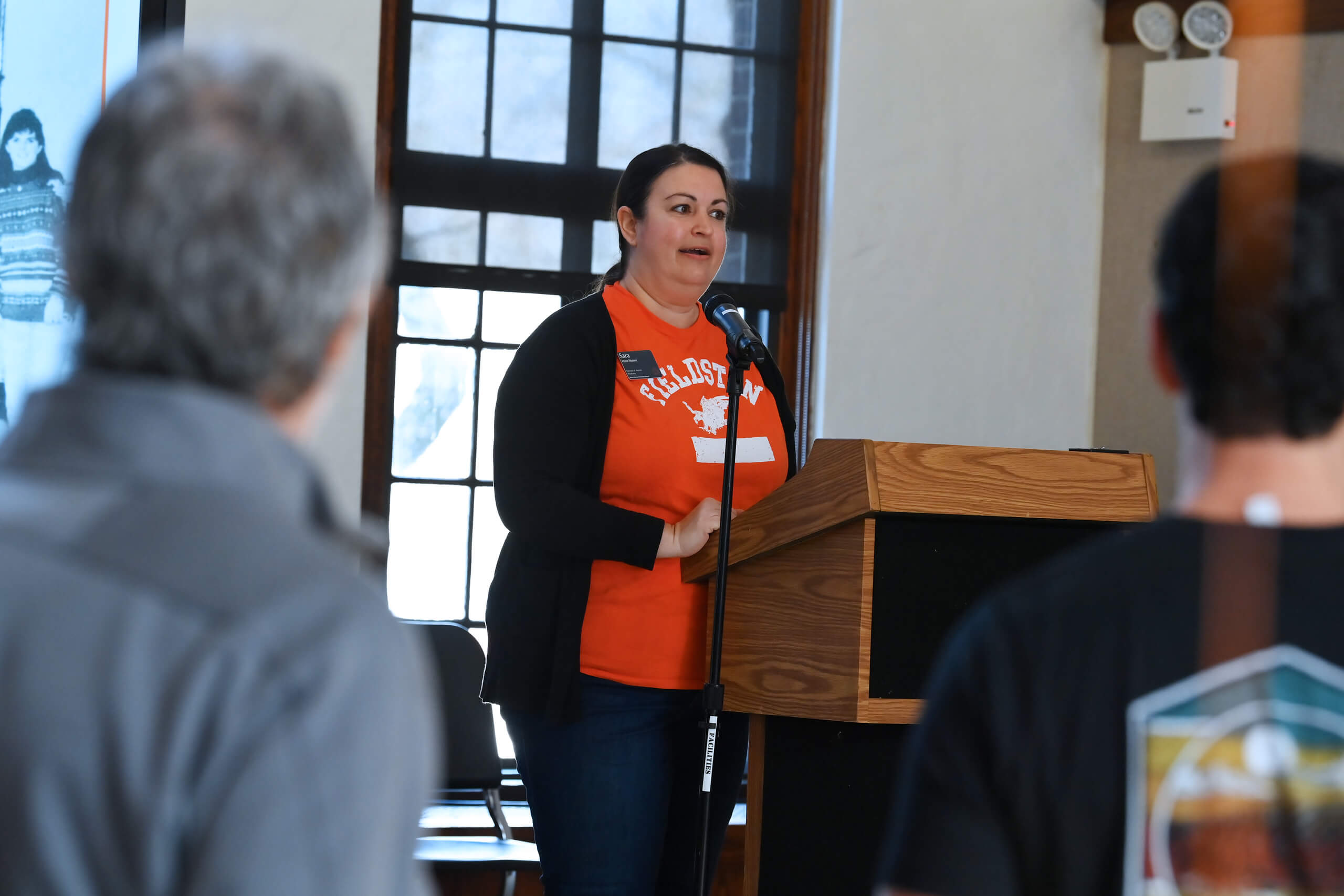 Director of Alumni Relations Sara Hunt-Munoz opens the Title IX reception with a brief speech.