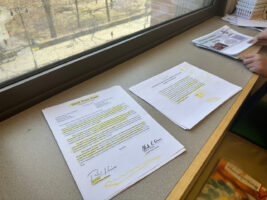 Stacks of research materials on the windowsill at Ethical Culture; students used these materials to conduct research for their projects.
