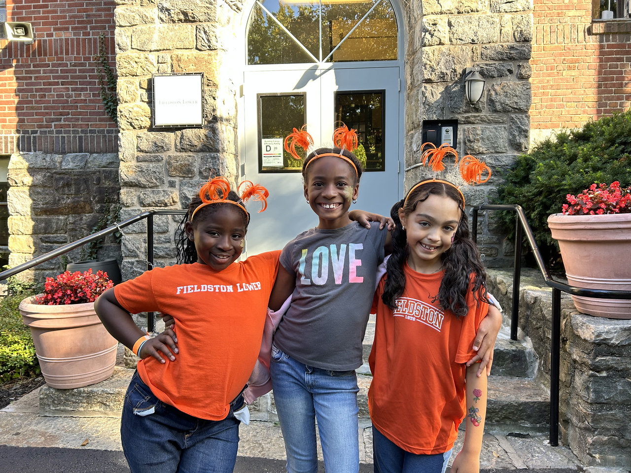Fieldston Lower students pose outside at Fall Carnival.