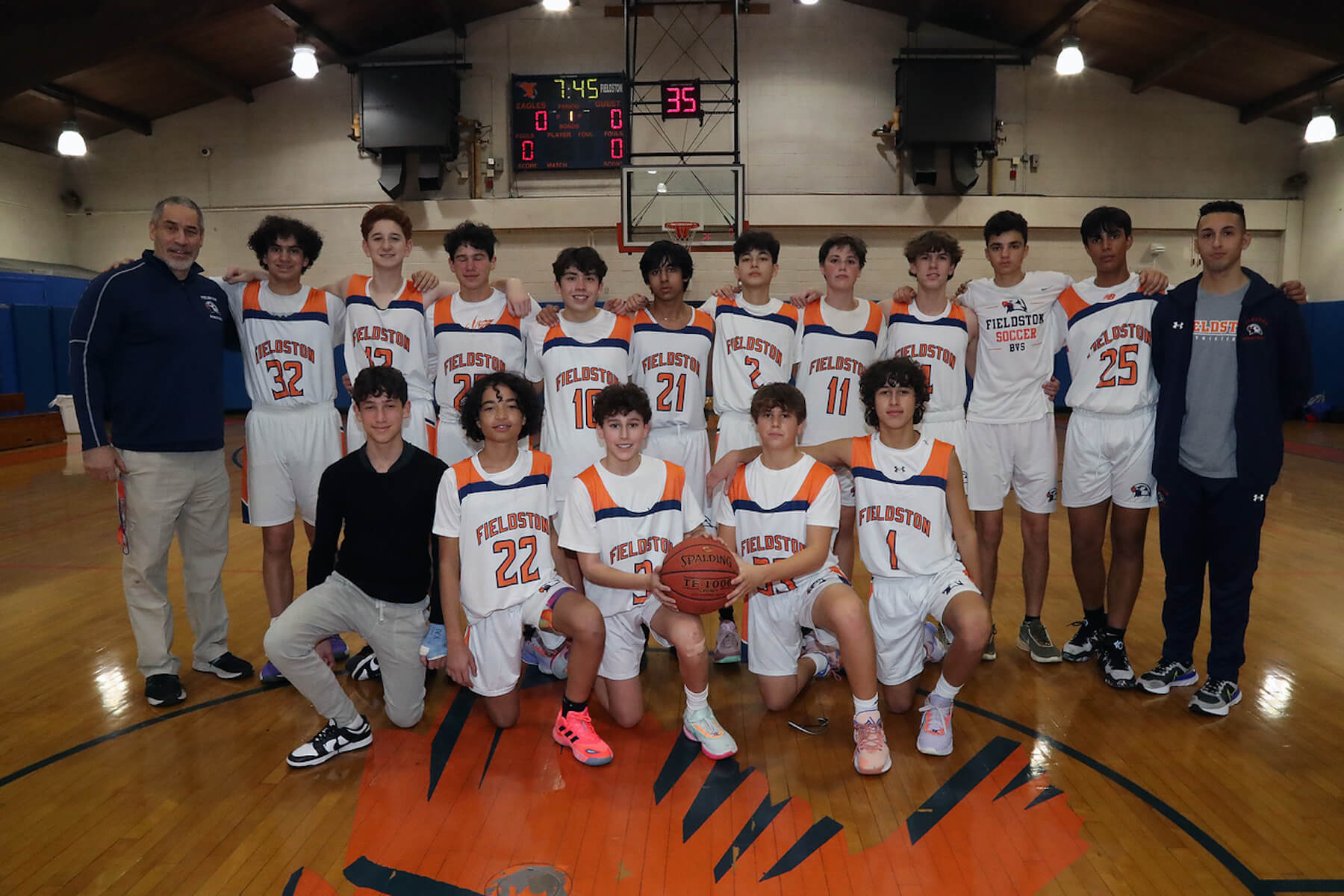 Fieldston Upper JV boys basketball team poses for group photo.