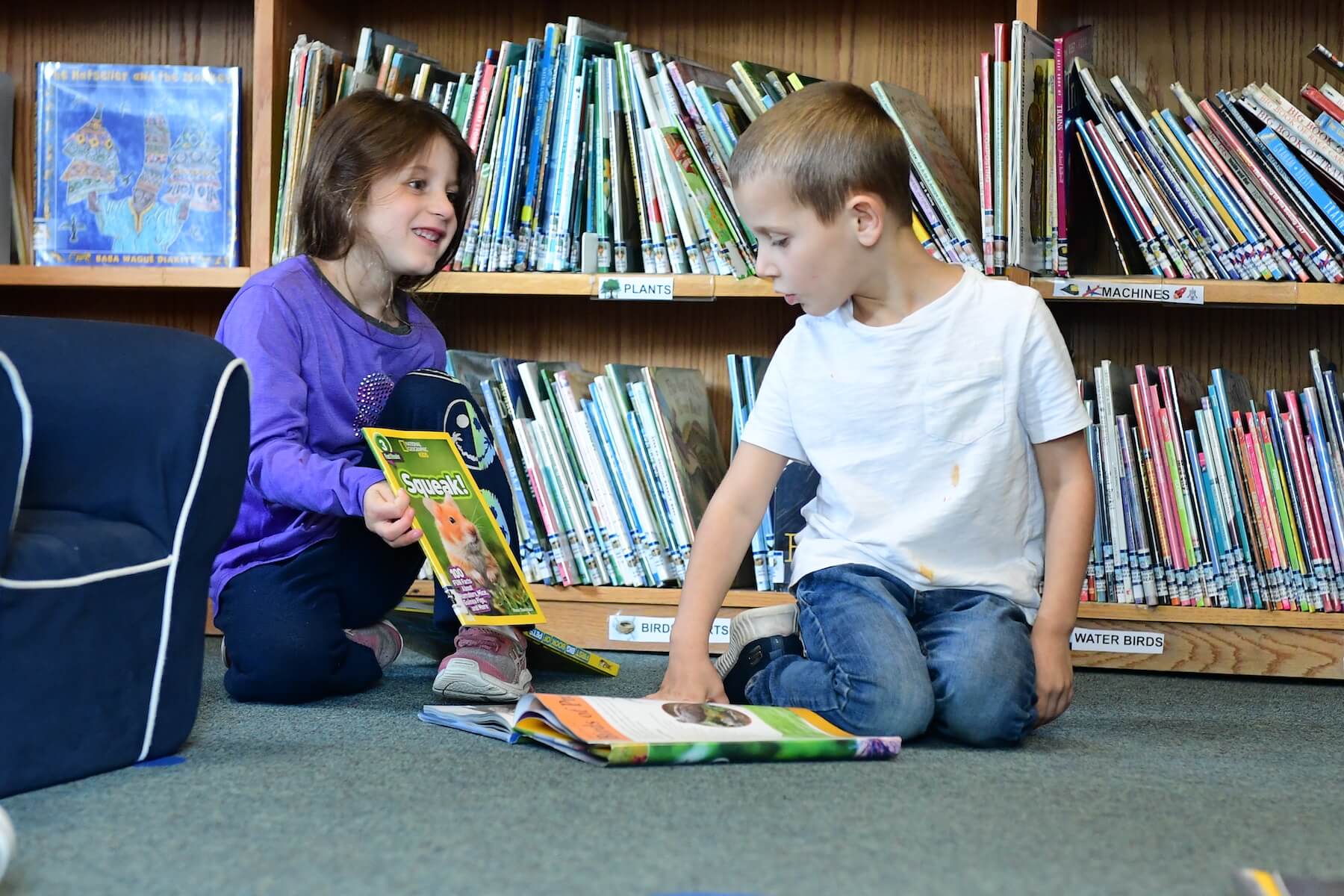 Ethical Culture Fieldston School Lower School students share books in the library