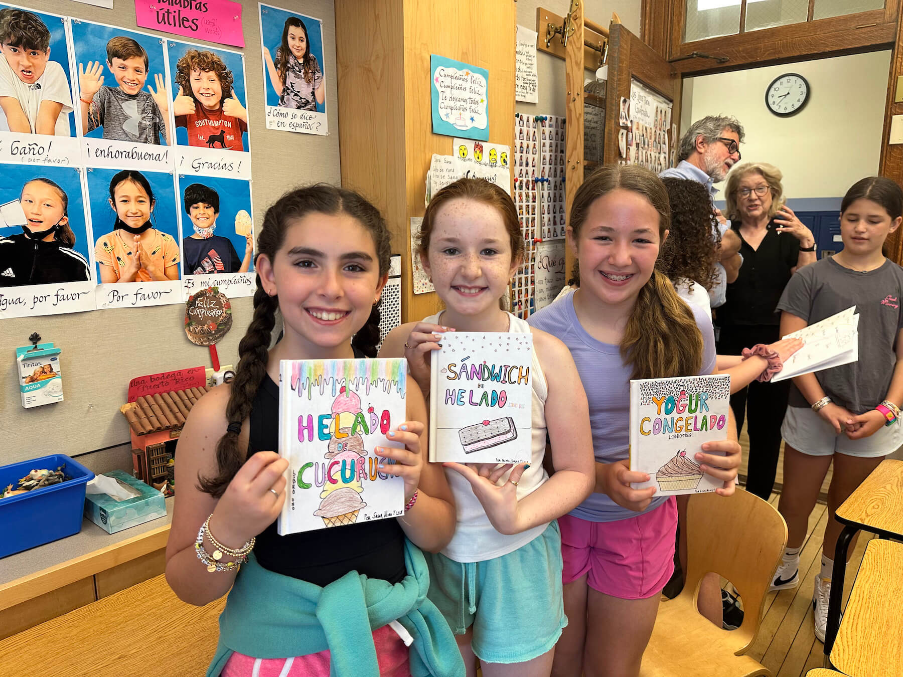 Ethical Culture Fieldston School Ethical Culture students hold up their handmade books in Spanish class