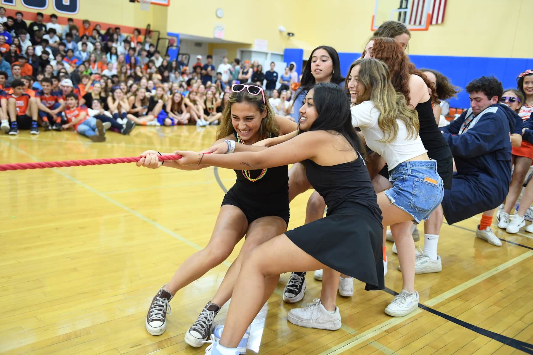 Ethical Culture Fieldston School Upper School students play tug-a-war in the gym during Pep rally