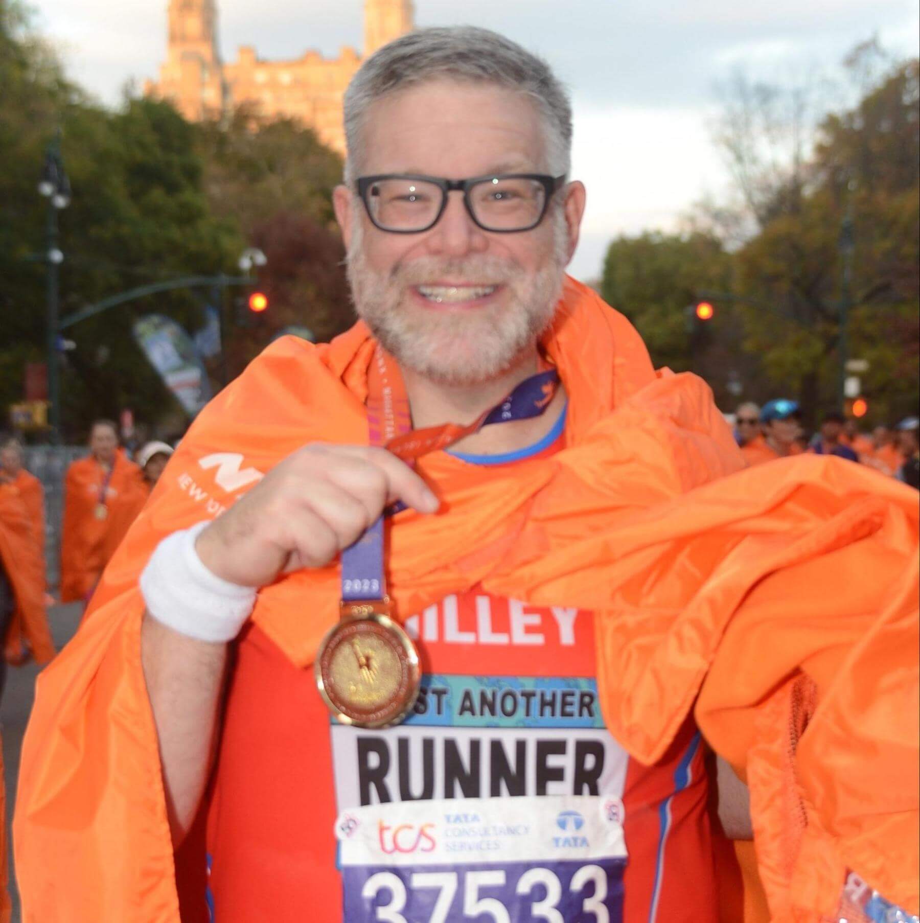 Ethical Culture Fieldston School faculty with marathon medal