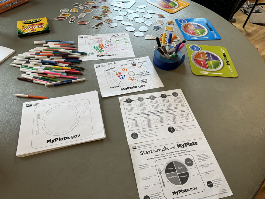 Worksheets on table with MyPlate activity.