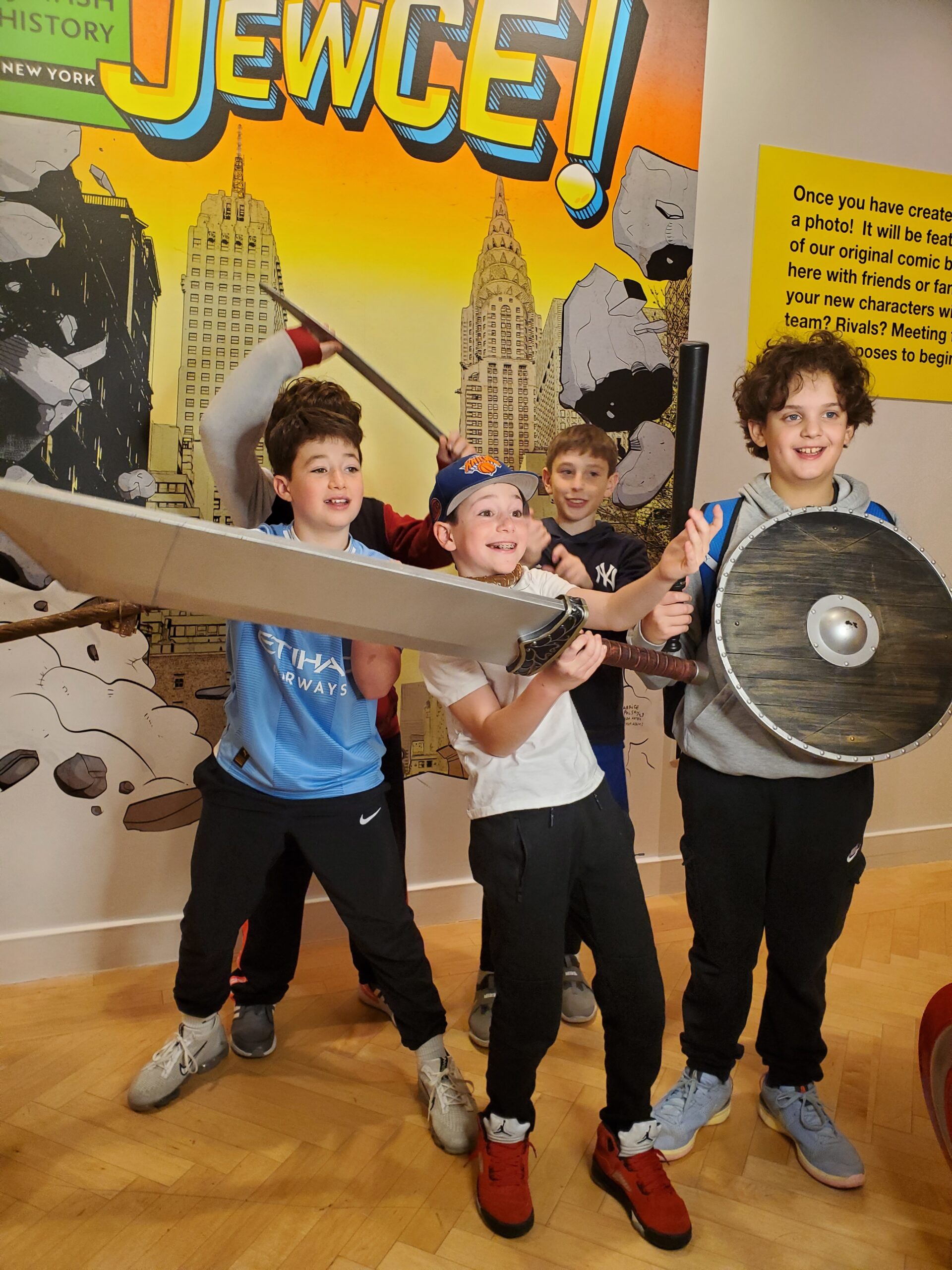 Ethical Culture students pose together on a field trip to the Jewish Comics exhibit.