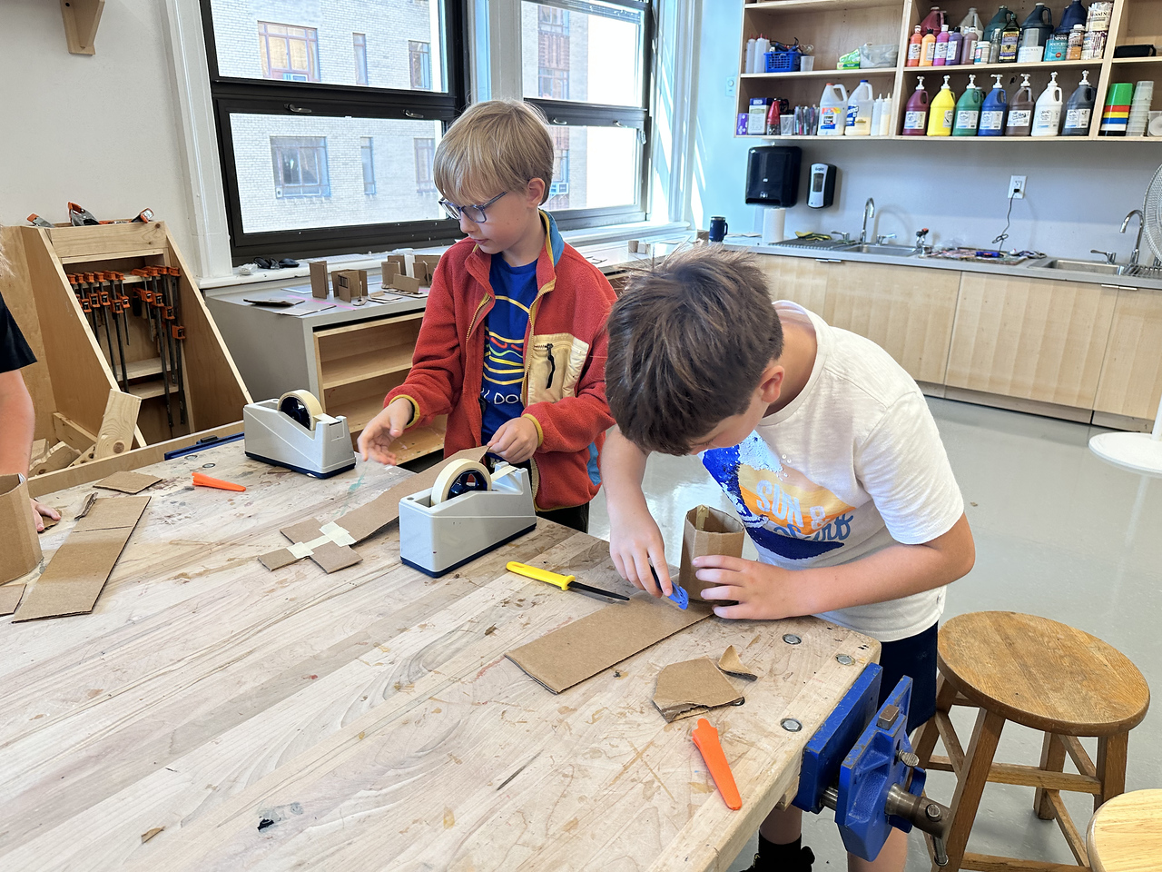 4th Grade Ethical Culture students work on shop project.