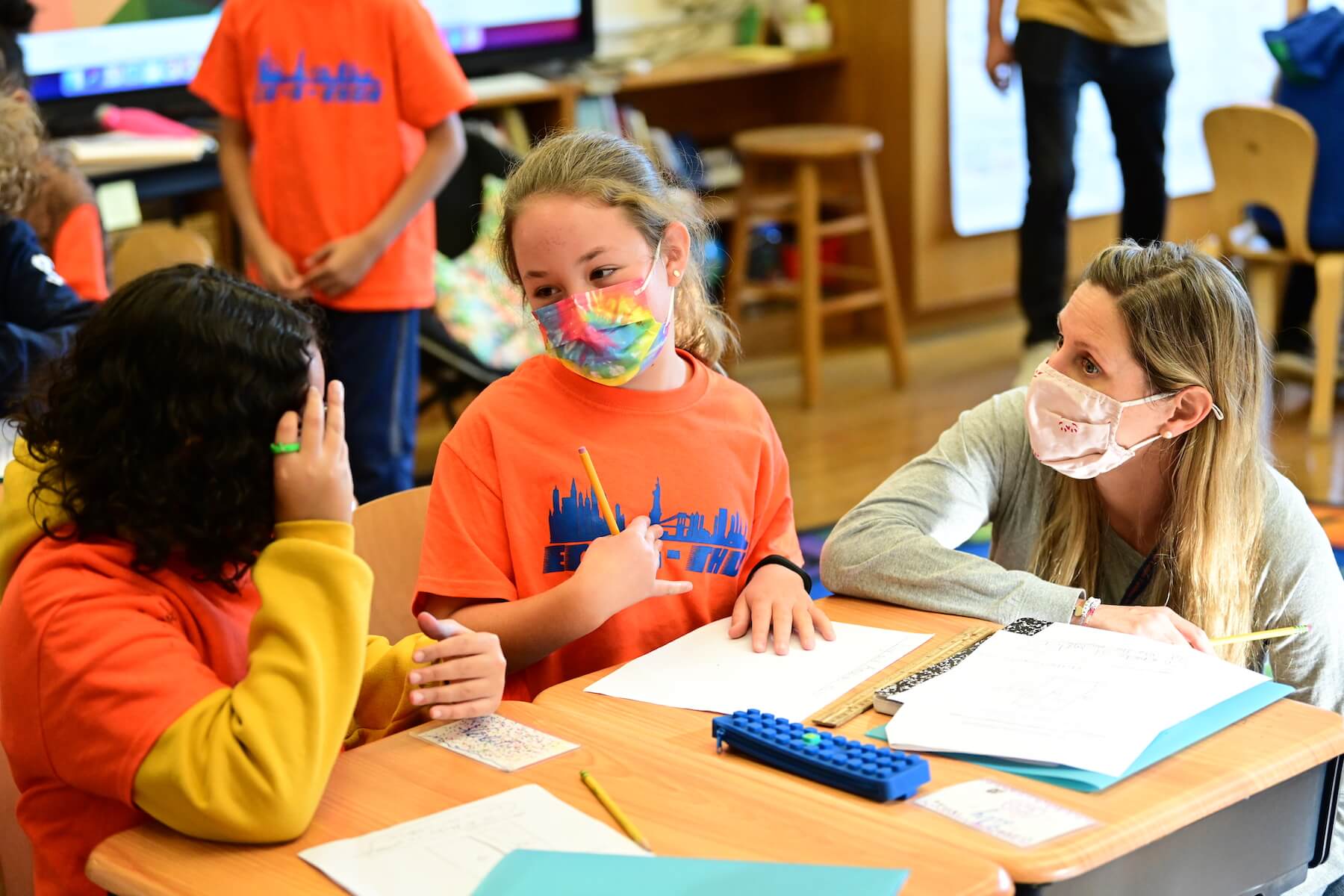 Ethical Culture Fieldston School Ethical Culture students sitting at desks engaged in discussion