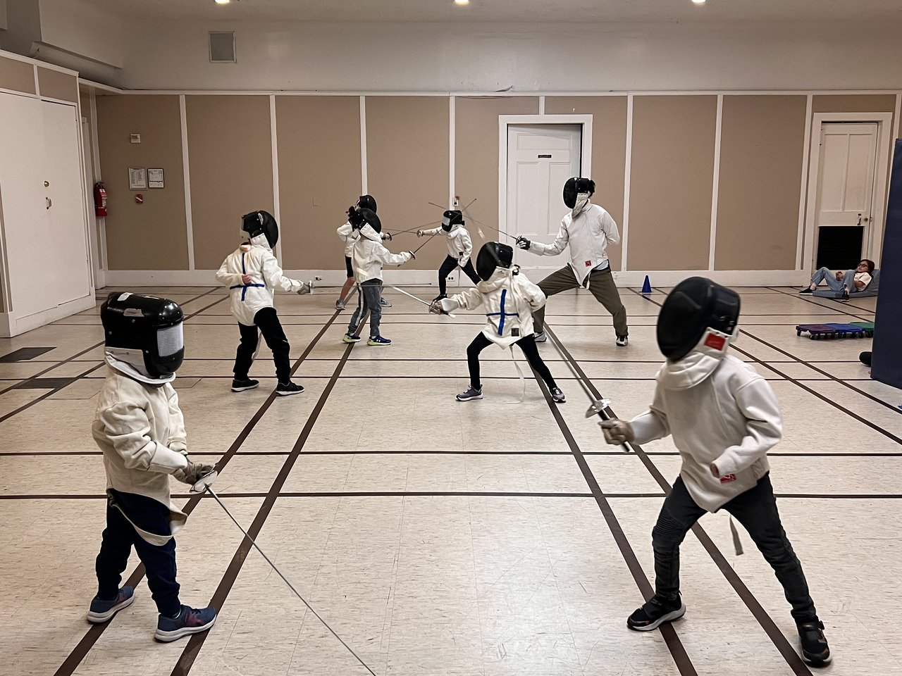 Ethical Culture students practice fencing during after school class.