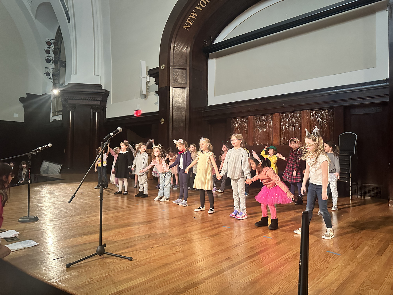 Ethical Culture students perform on stage at the culmination of the DramaZone after school program.