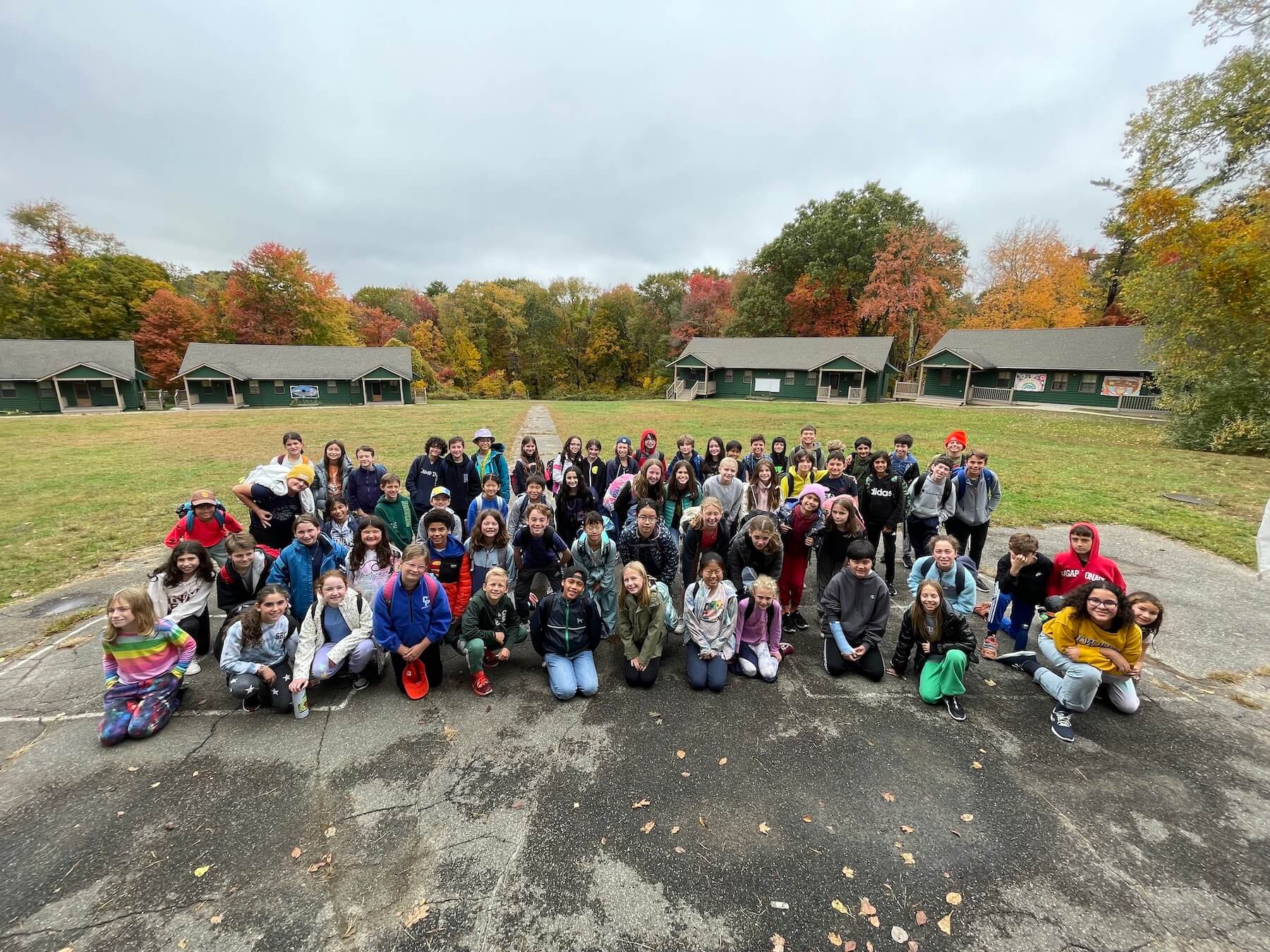 Ethical Culture's 5th Grade poses for group picture outside at Nature's Classroom