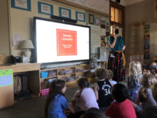 At Ethical Culture Fieldston School, 2nd Graders sit on floor as teacher presents discussion on Spotted Lanternflies