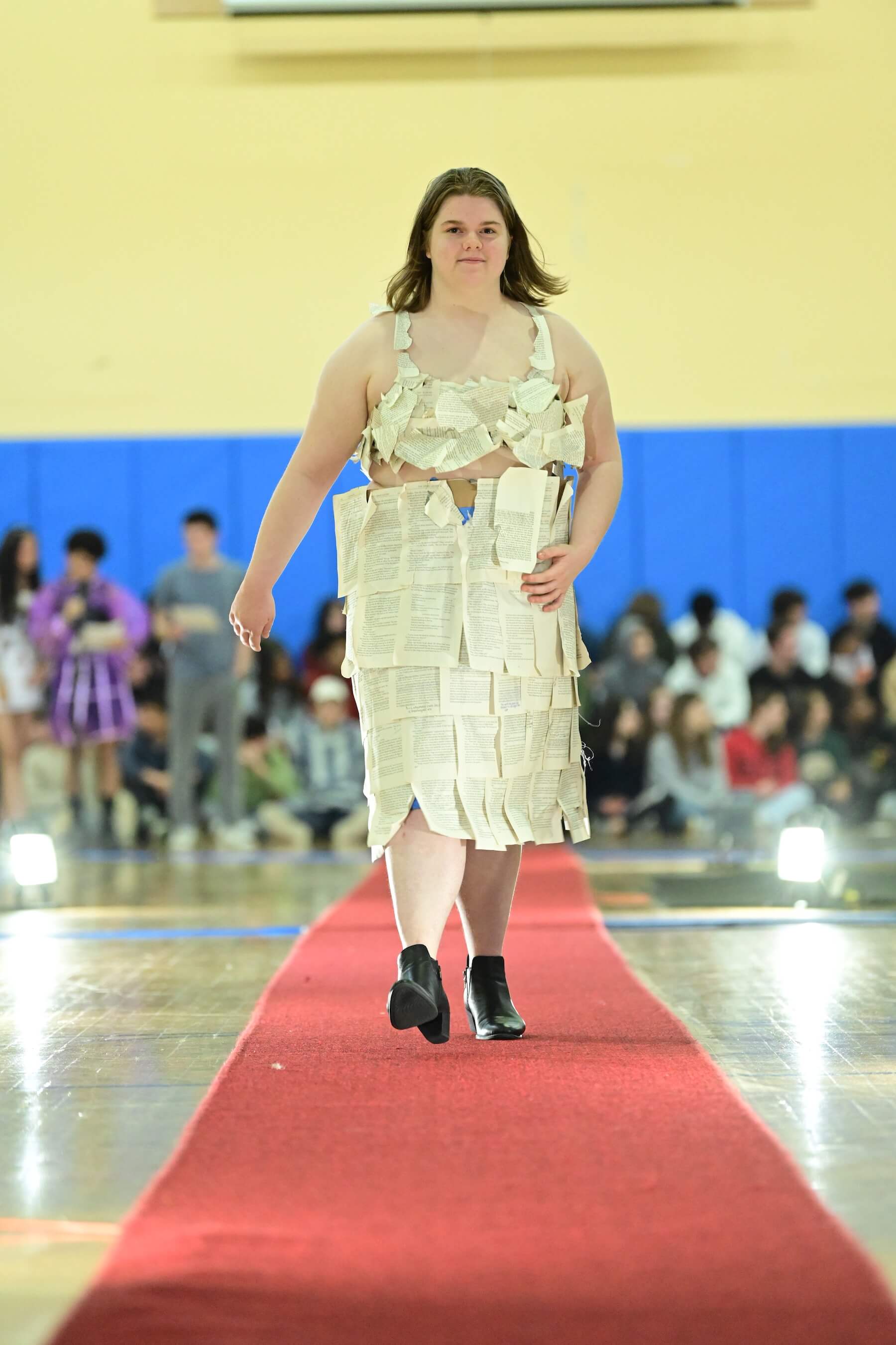 An Ethical Culture Fieldston Upper School student models at the Fashion Show.