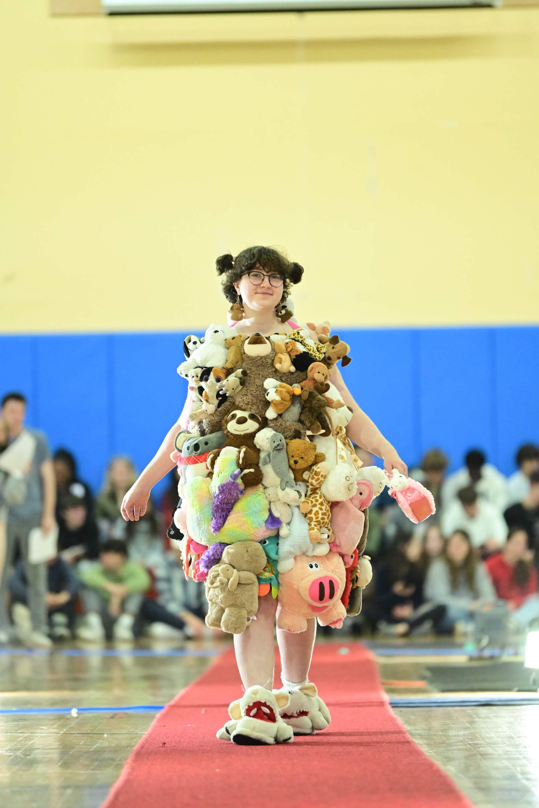 An Ethical Culture Fieldston Upper School student models at the Fashion Show.