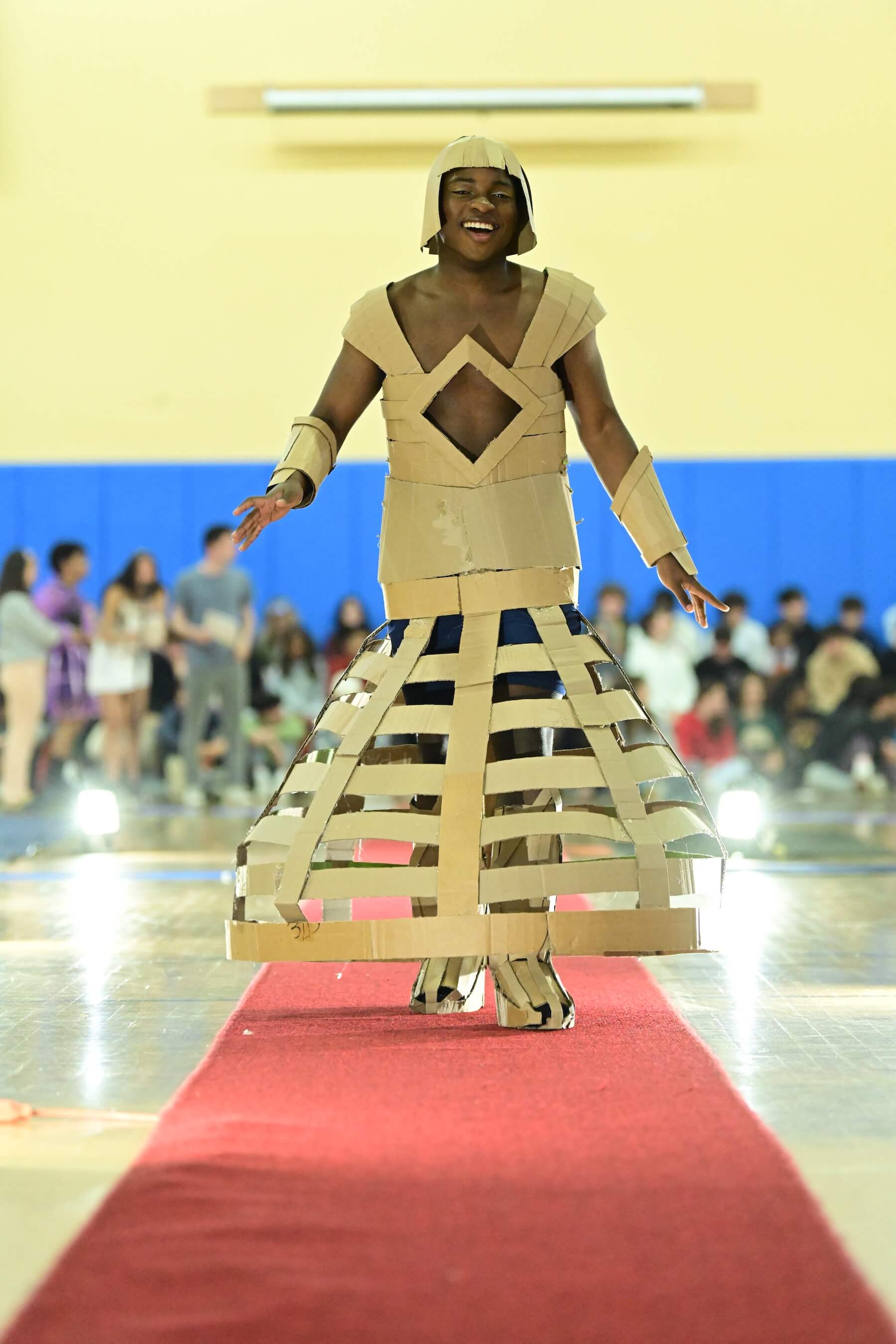 An Ethical Culture Fieldston Upper School student models at the Fashion Show.