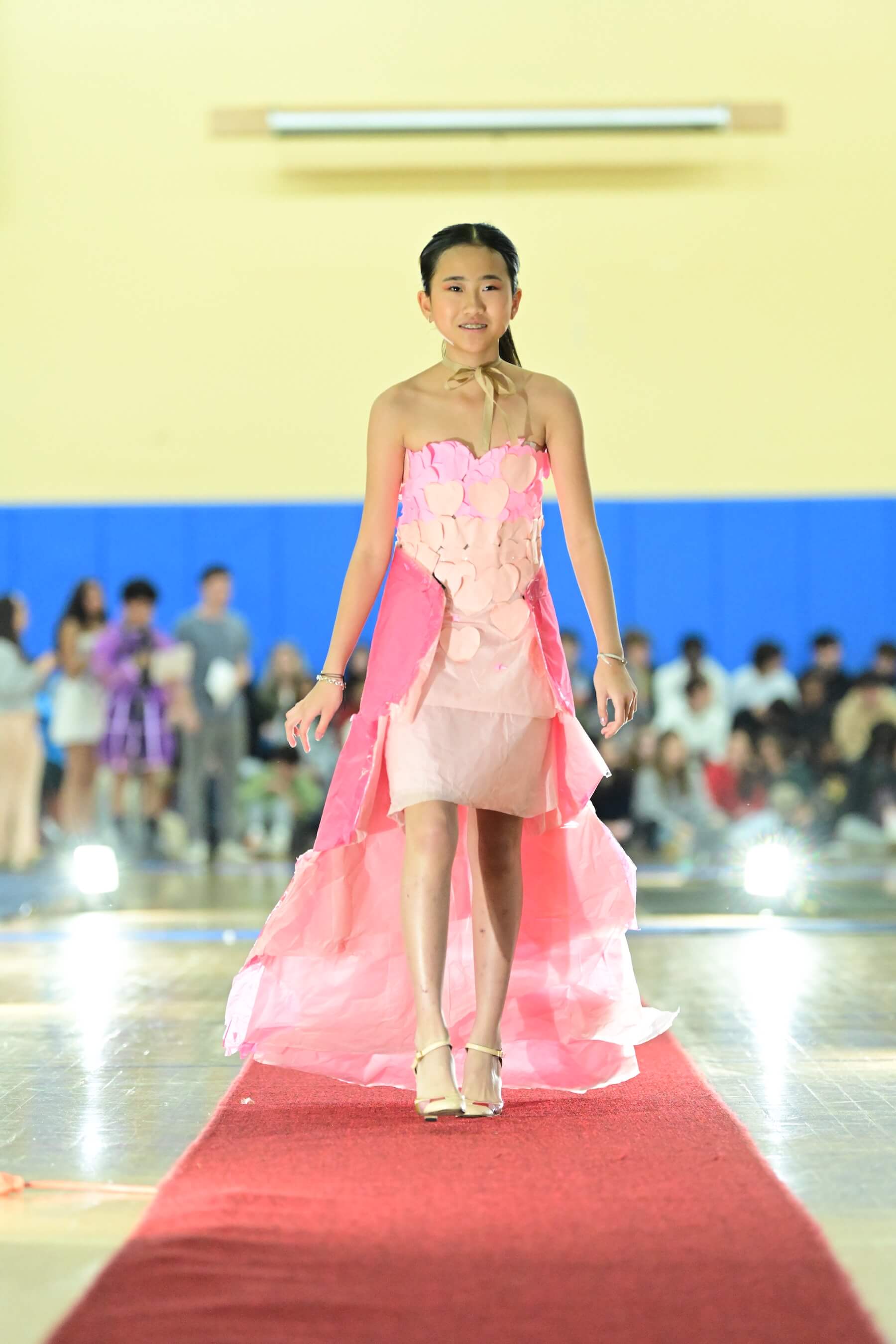 An Ethical Culture Fieldston Middle School student models at the Fashion Show.