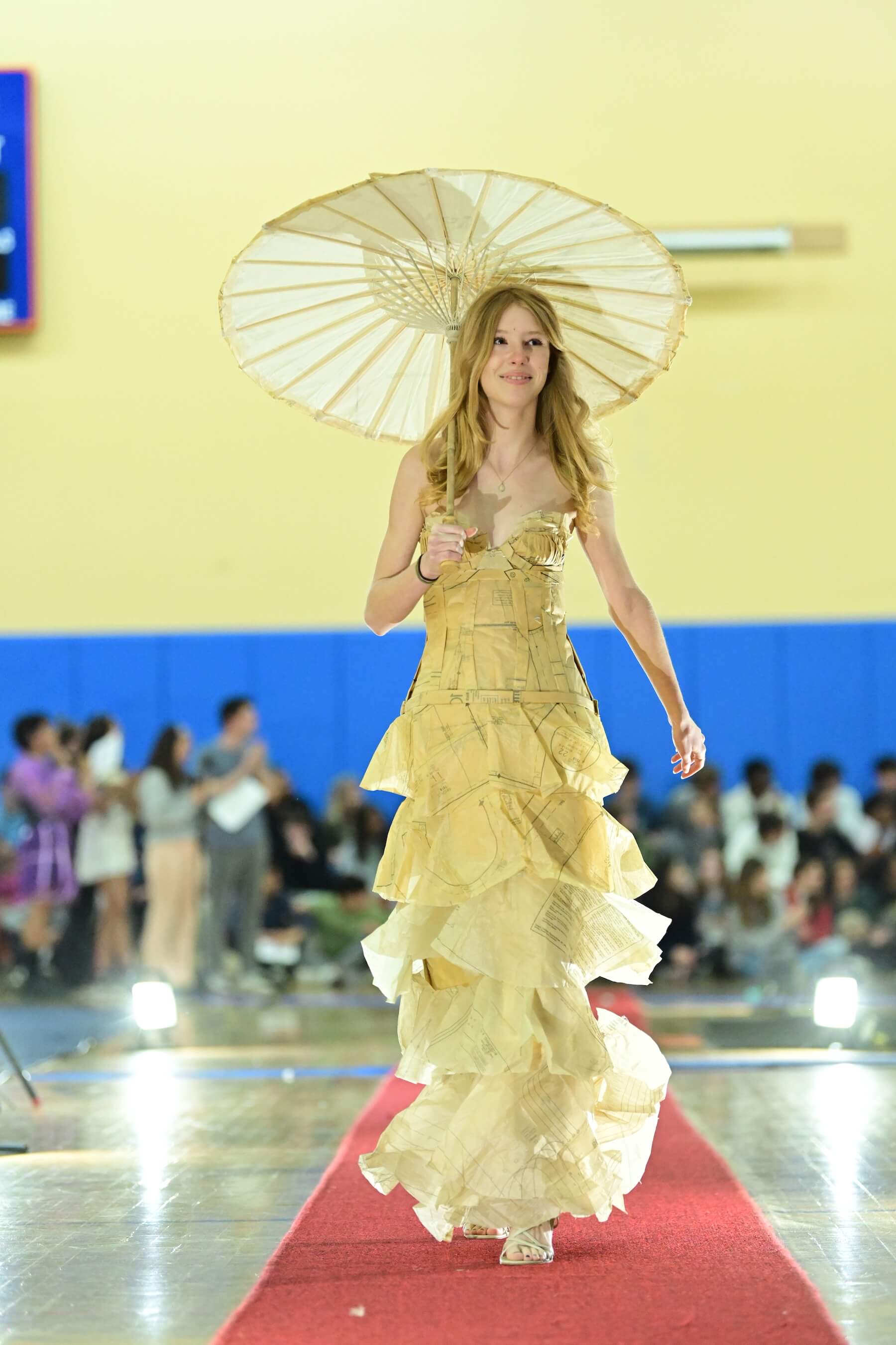 An Ethical Culture Fieldston Upper School student models at the Fashion Show.