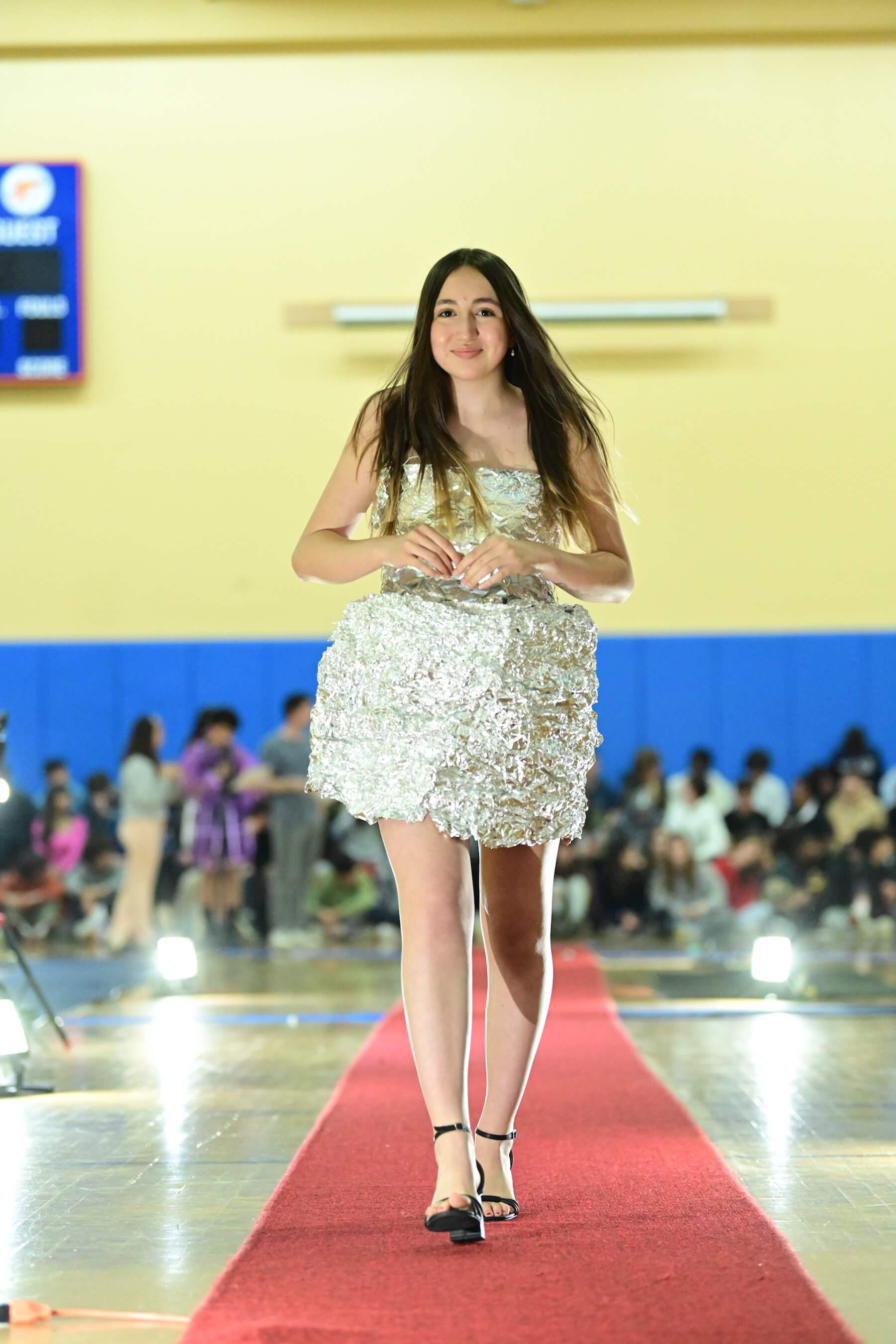 An Ethical Culture Fieldston Middle School student models at the Fashion Show.