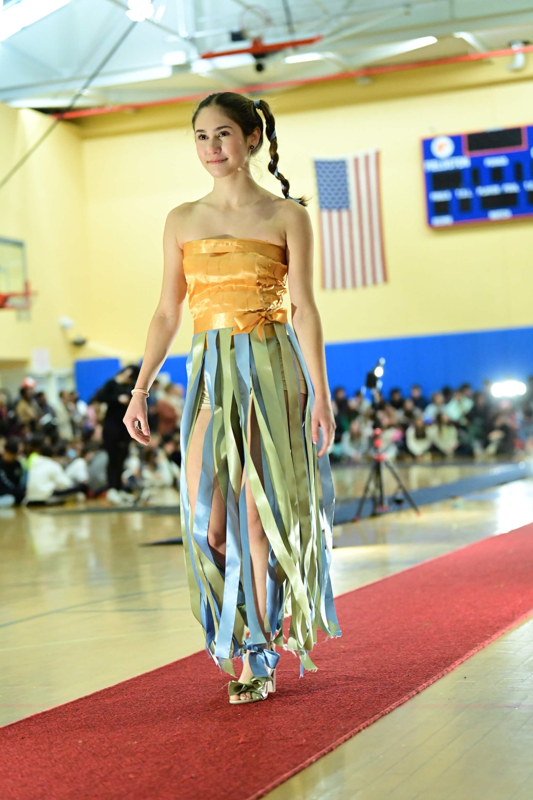 An Ethical Culture Fieldston Upper School student models at the Fashion Show.