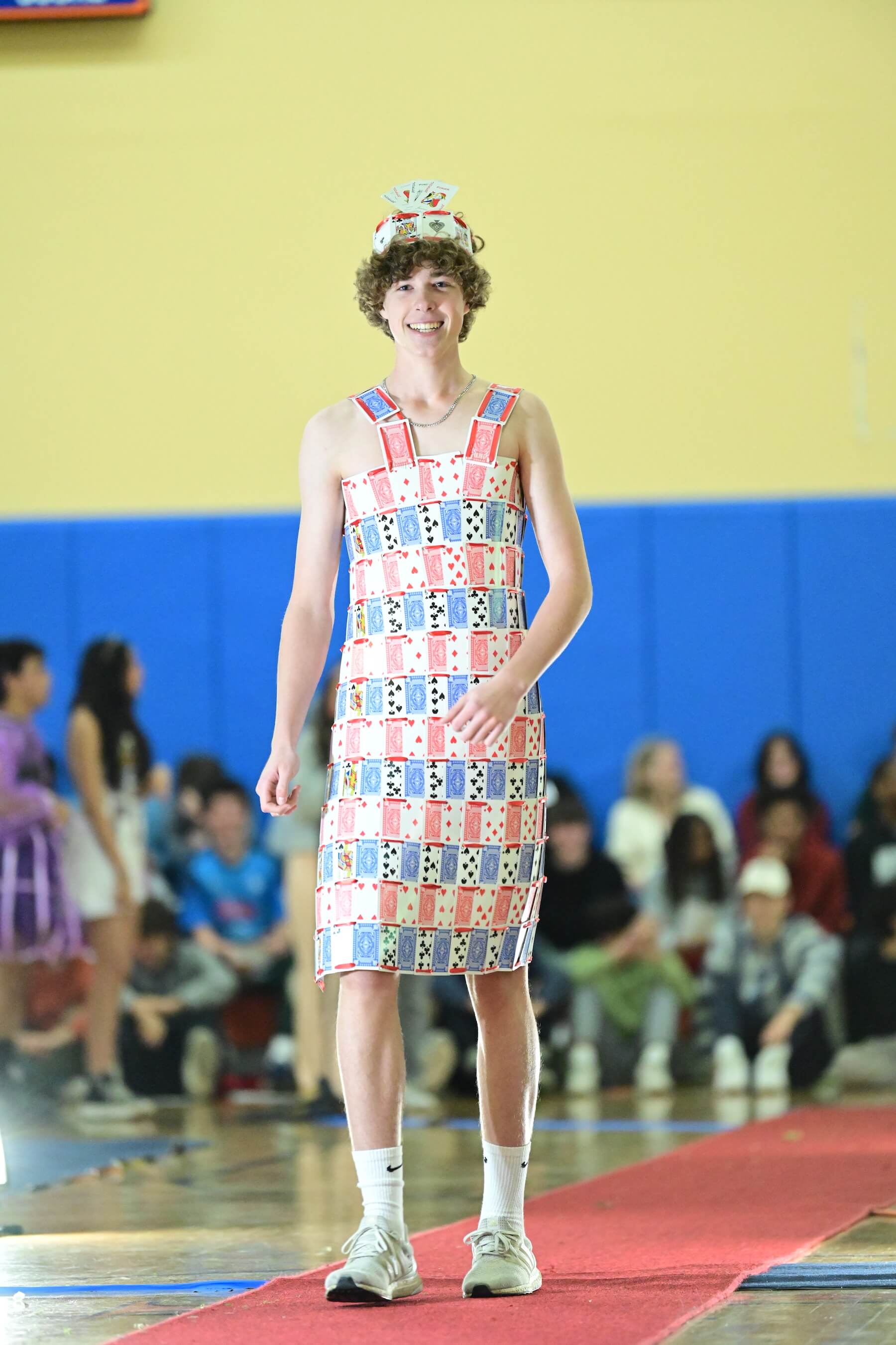 An Ethical Culture Fieldston Upper School student models at the Fashion Show.