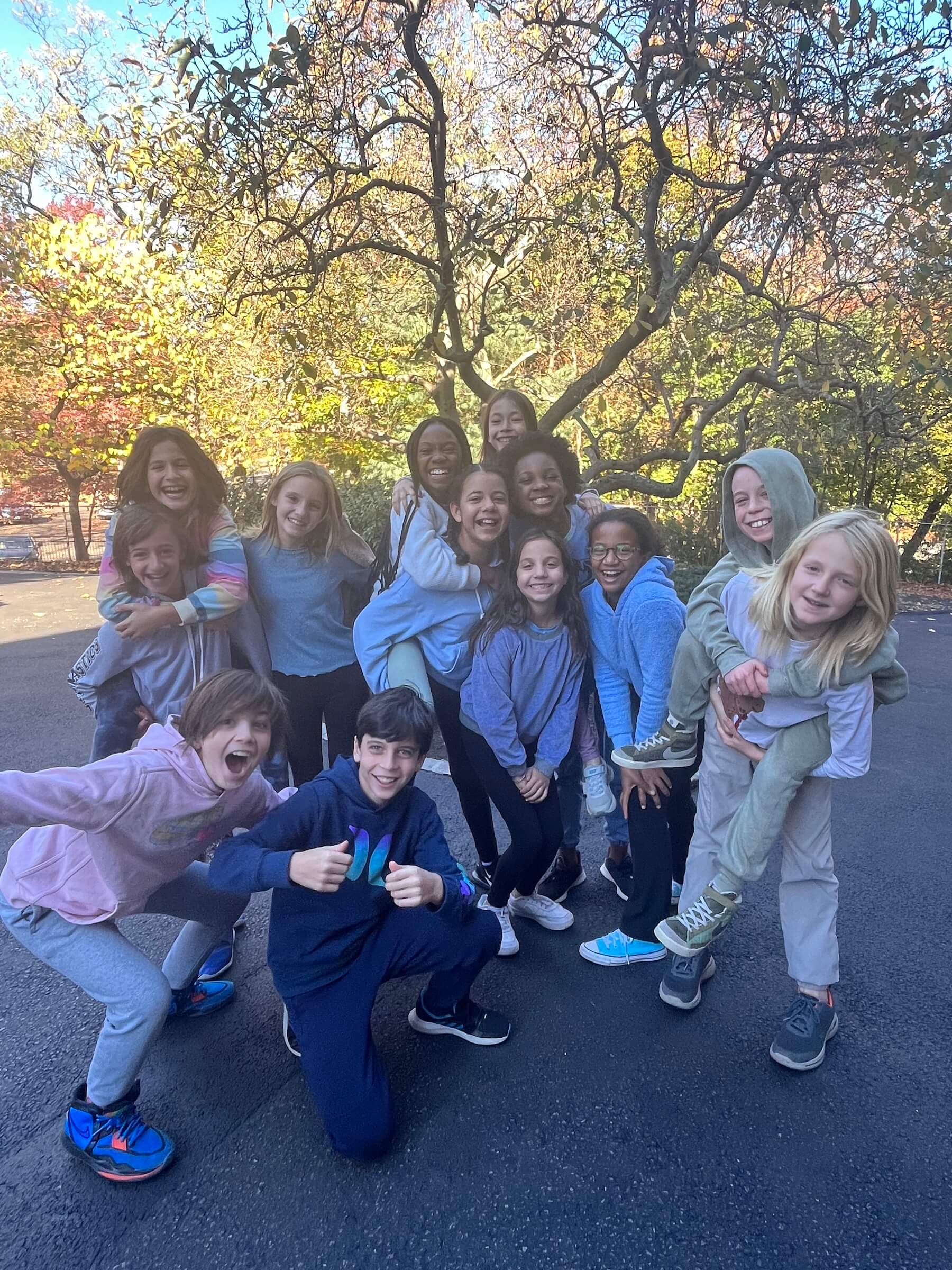 Ethical Culture Fieldston School group of Fieldston Lower students smiling at the camera