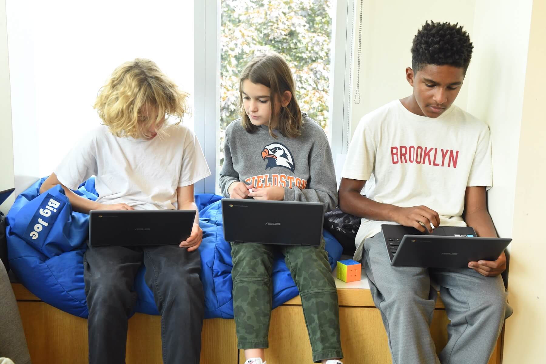 Ethical Culture Fieldston School Fieldston Middle students working on school work while on chromebooks