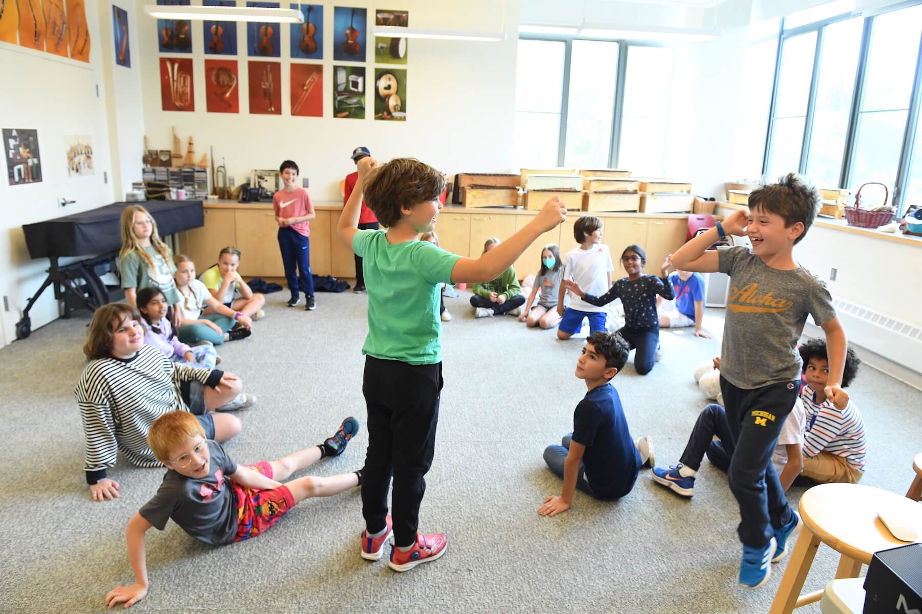 Ethical Culture Fieldston School Fieldston Lower students sitting in circle during music class