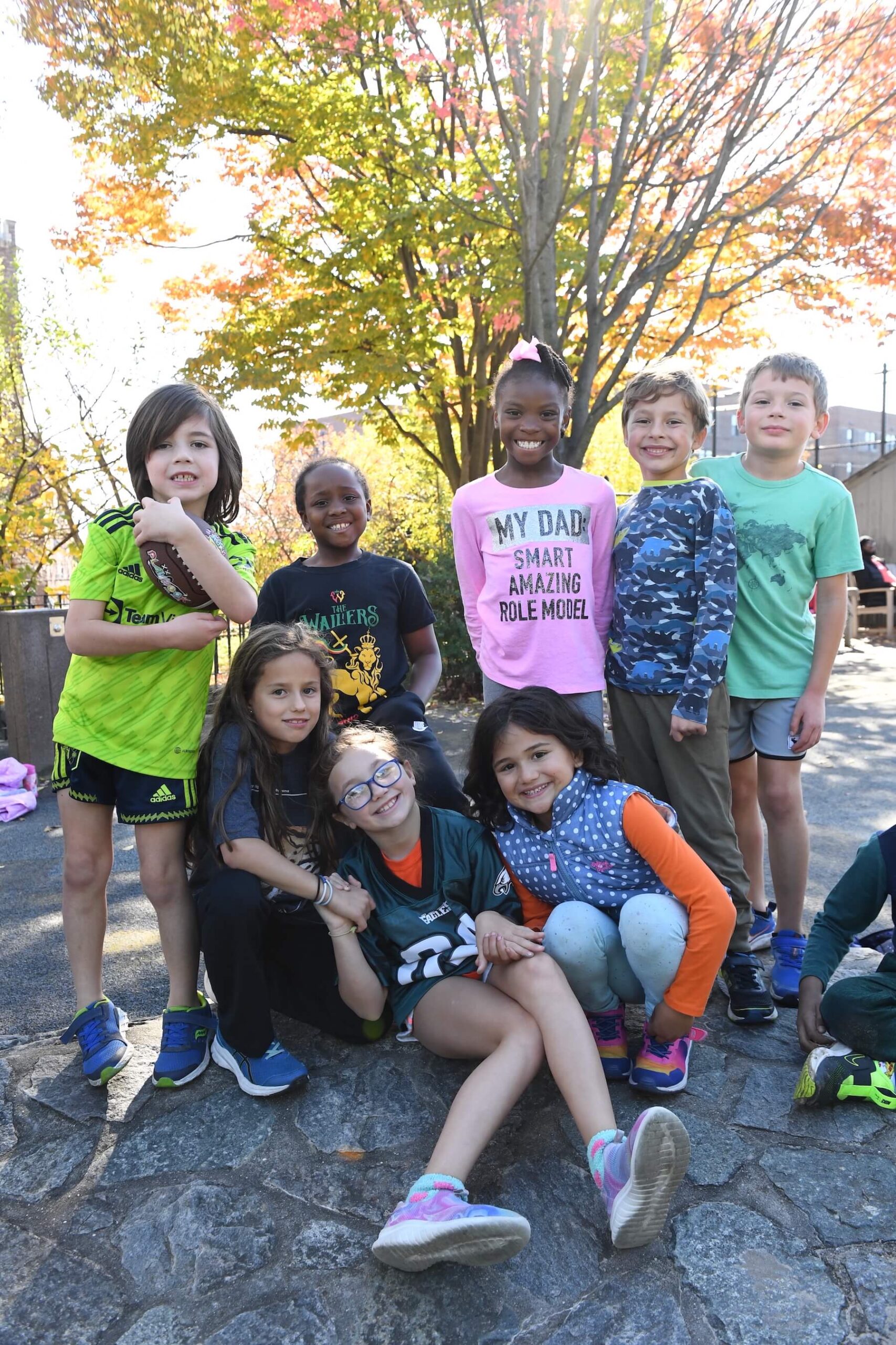 Ethical Culture Fieldston School group of Fieldston Lower students smiling at the camera