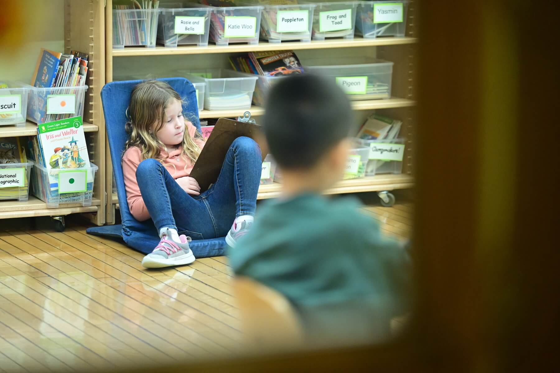 Ethical Culture Fieldston School student enjoying a book during independent reading