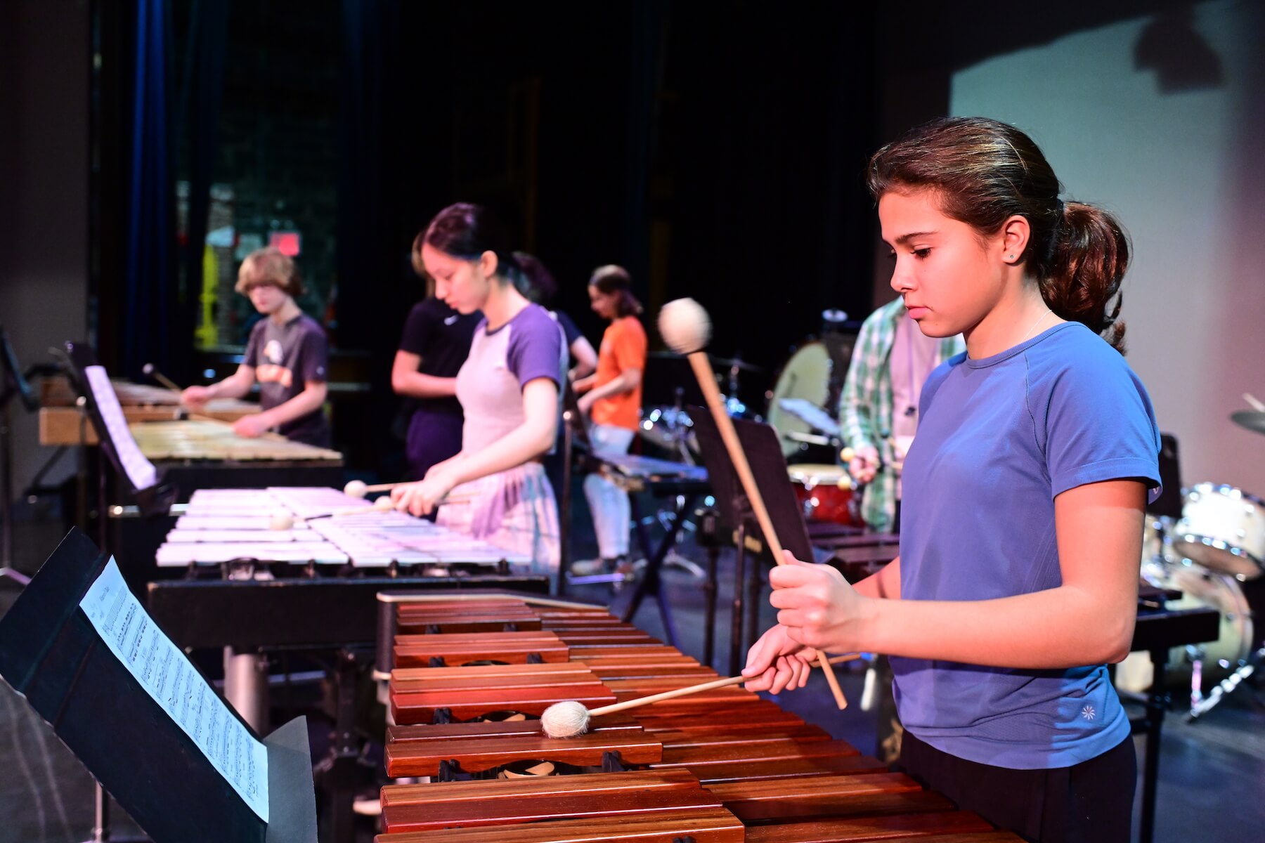 Ethical Culture Fieldston School students preparing to perform for Fieldston Middle percussion performance