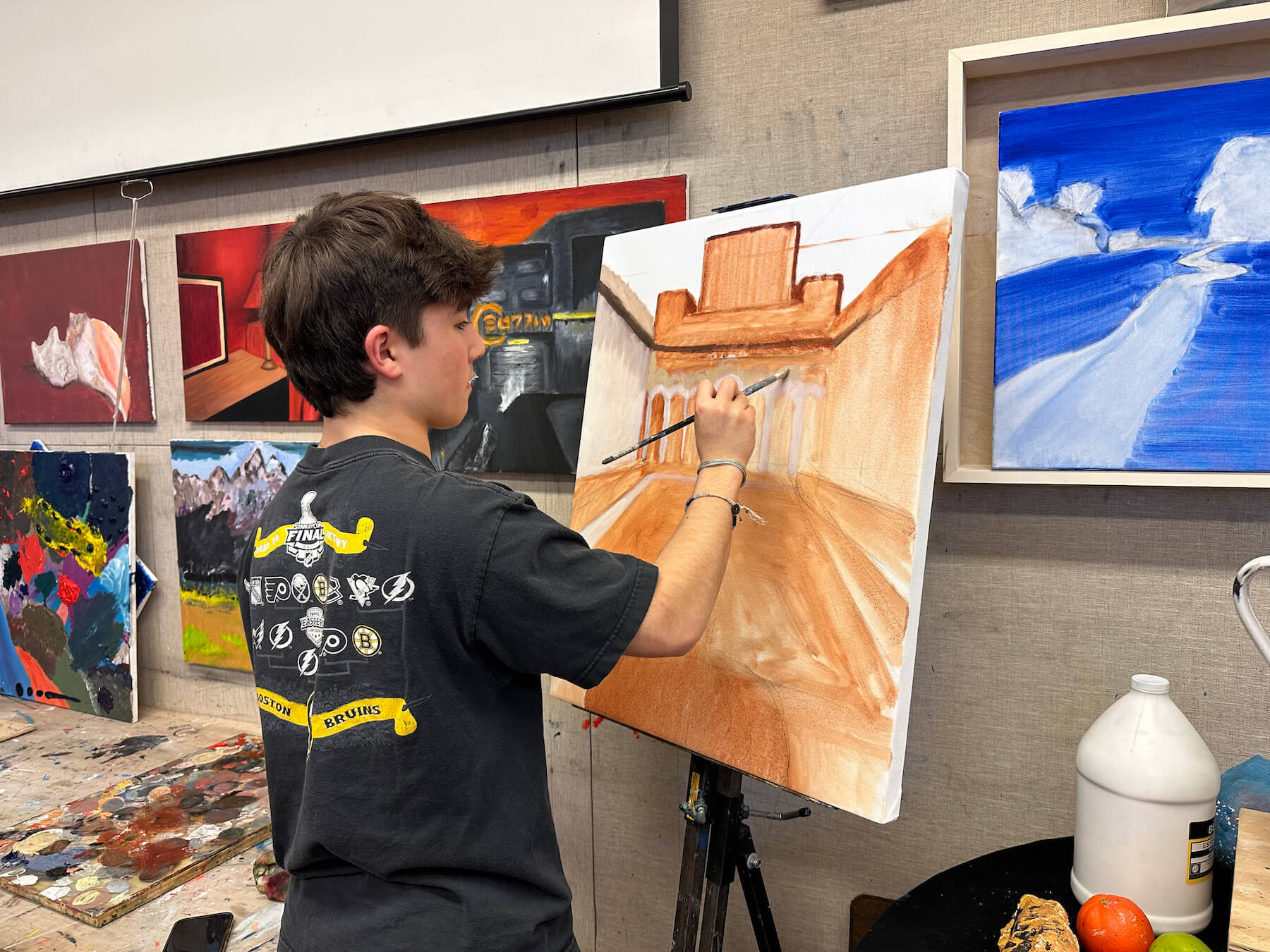 Ethical Culture Fieldston School_Feel Good Photos_Fieldston Middle student paints on canvas during art class