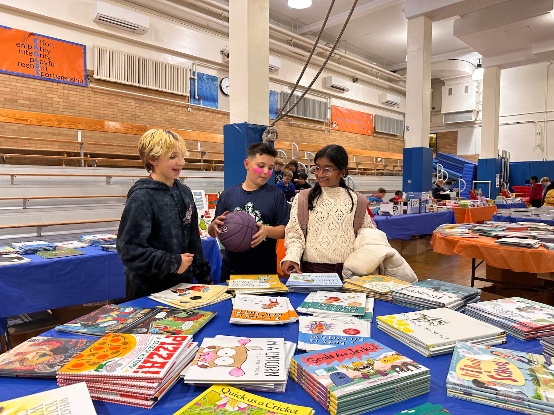 Ethical Culture Fieldston School_Feel Good Photos_Fieldston Lower students shop for books at the Book Fair